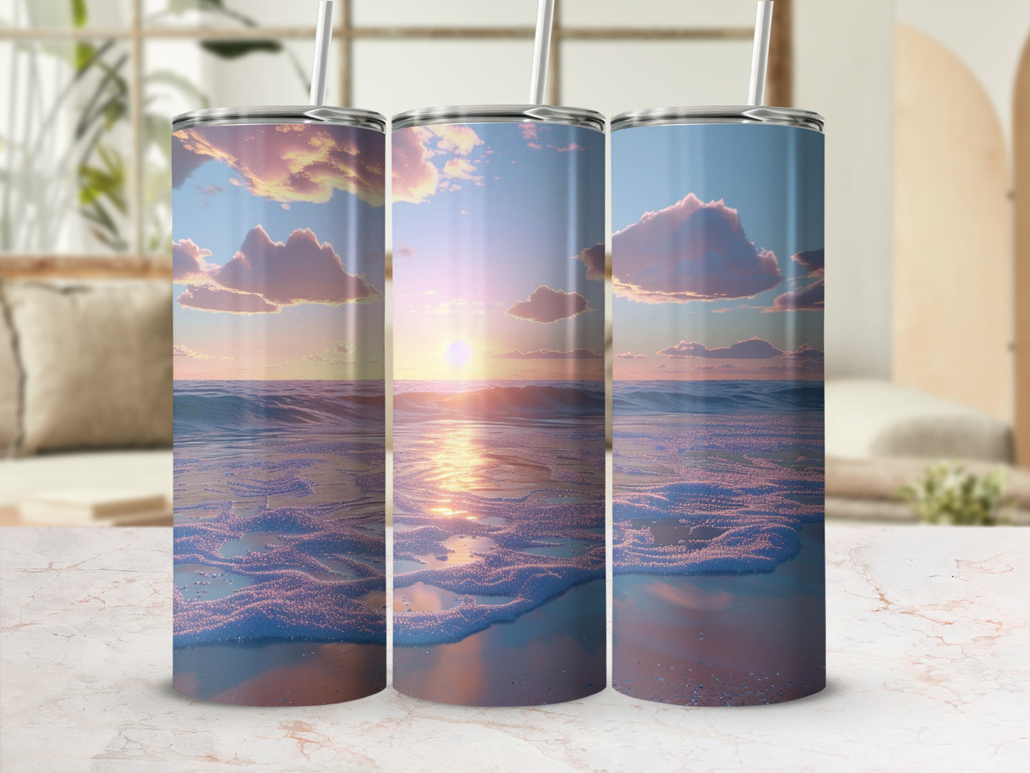 Three tumblers featuring a sunset over an ocean with pink-tinged clouds.