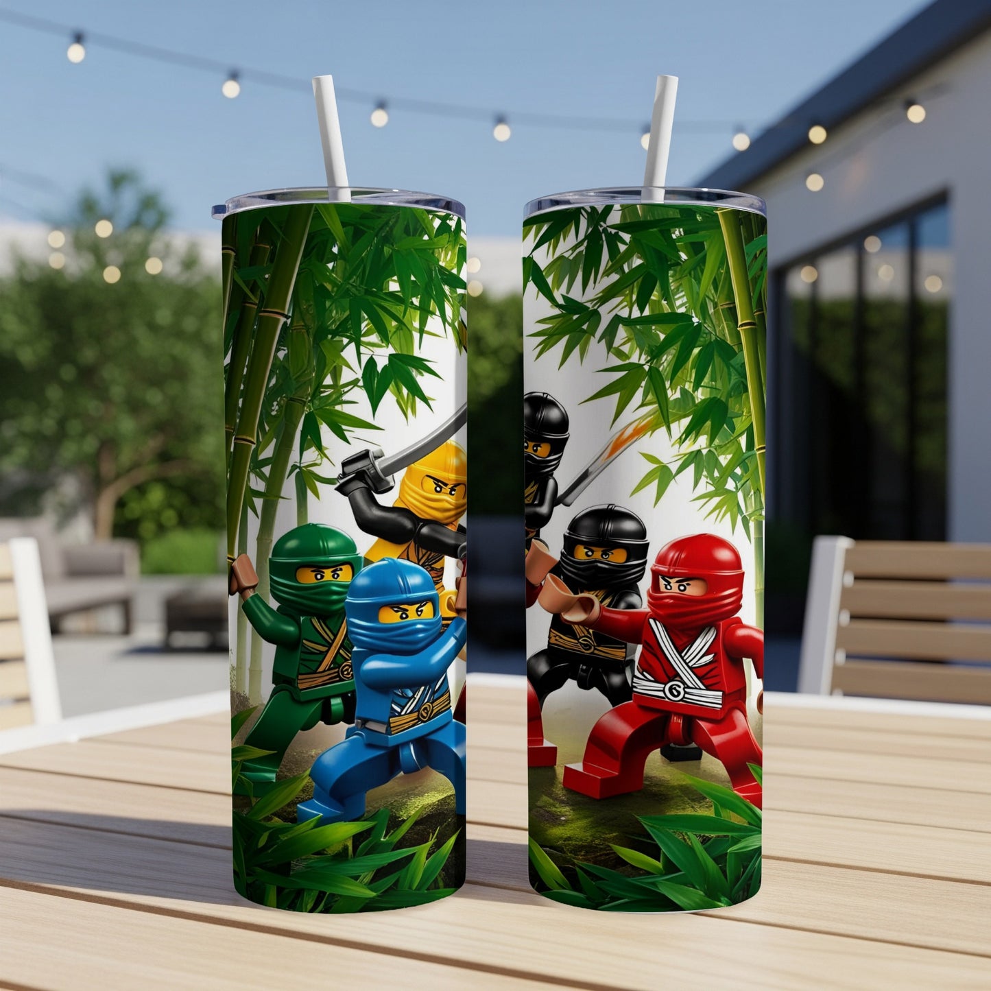 Ninjago characters in action, surrounded by bamboo, on two insulated tumblers.