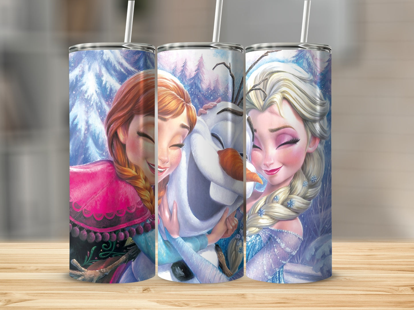 Anna and Elsa hug Olaf in front of a snowy forest background.