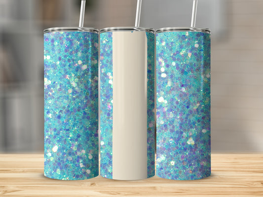 Three glitter tumblers with teal and purple sparkle on a wooden surface.