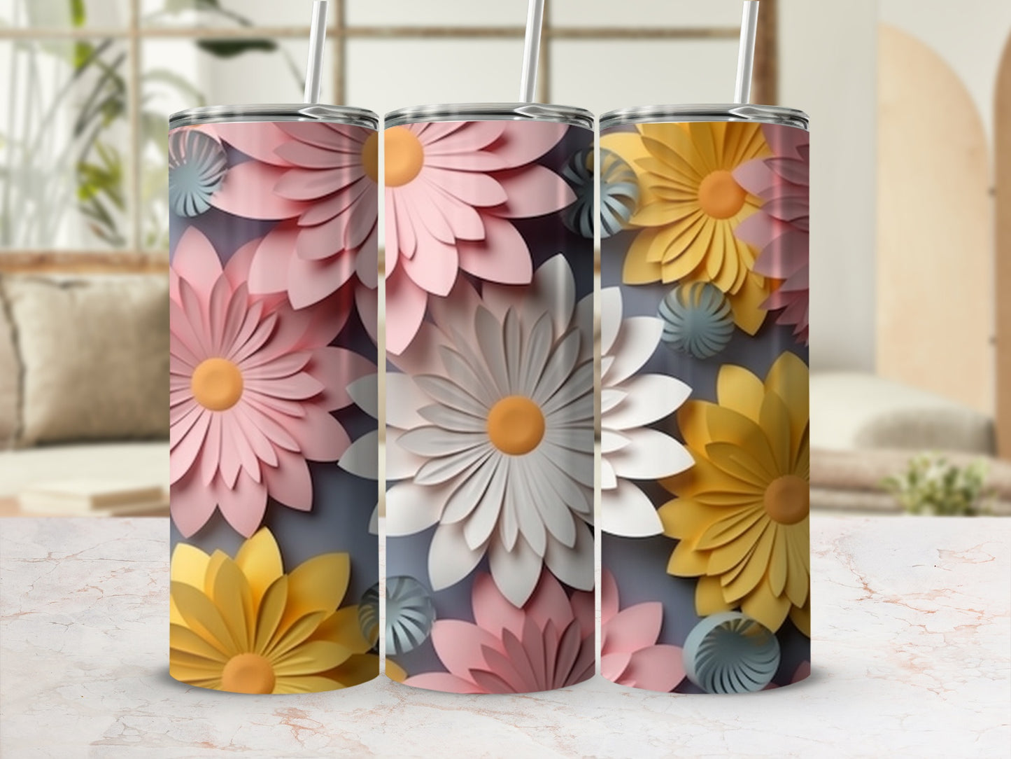 Three floral tumbler cups with pink, white, and yellow flowers on a light background.