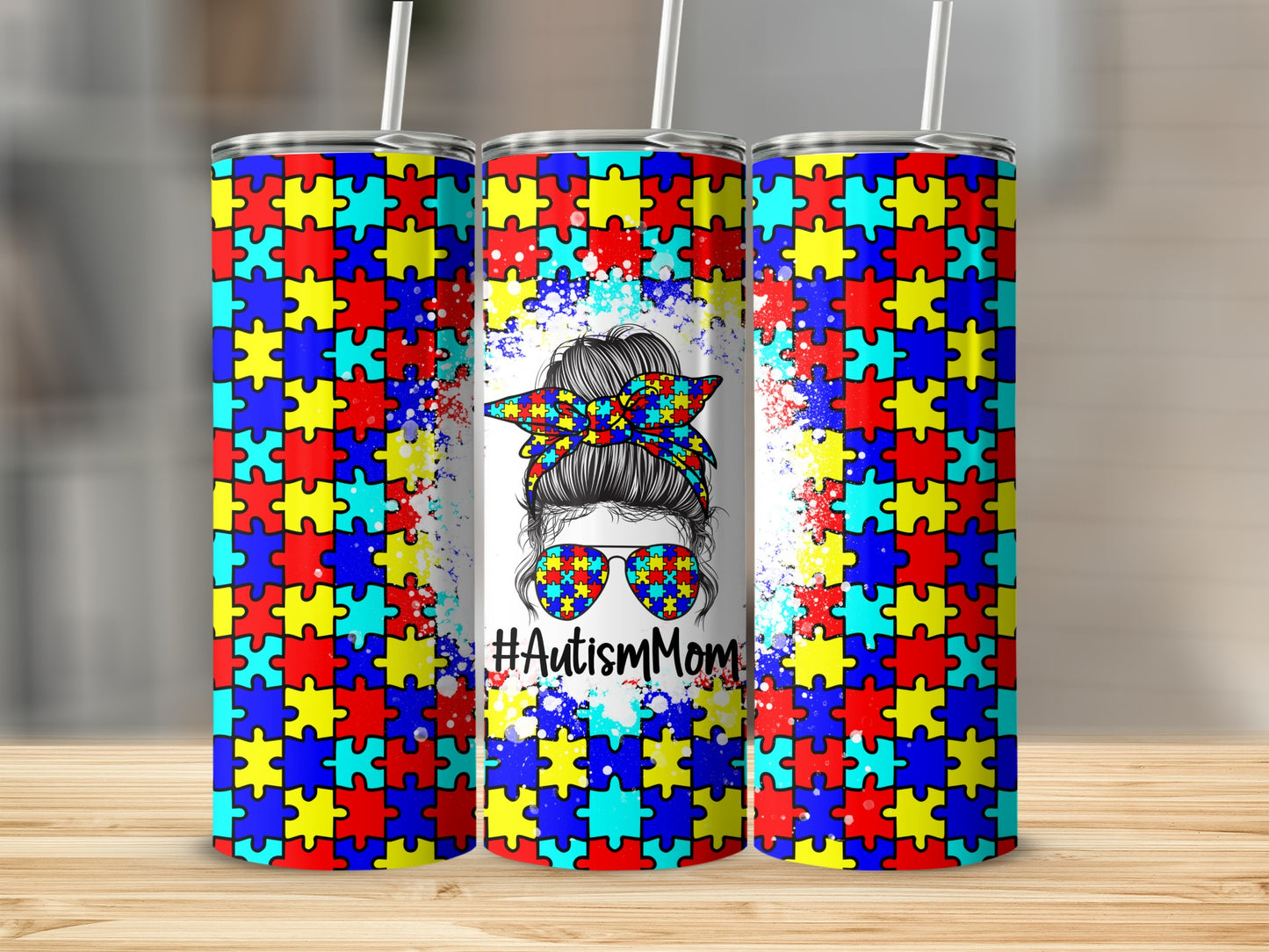 Autism Mom tumbler with puzzle piece pattern and messy bun graphic.