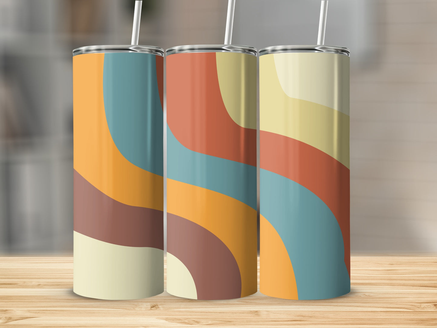 Three tumblers with abstract wavy patterns in cream, brown, teal, and orange.