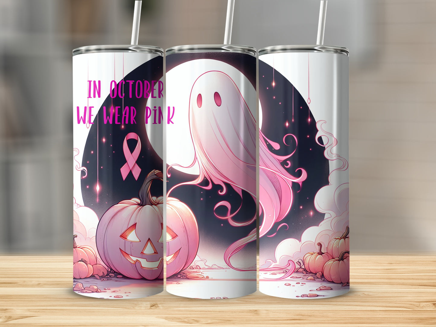 Pink ghost, jack-o'-lantern, and pumpkins with breast cancer awareness ribbon.