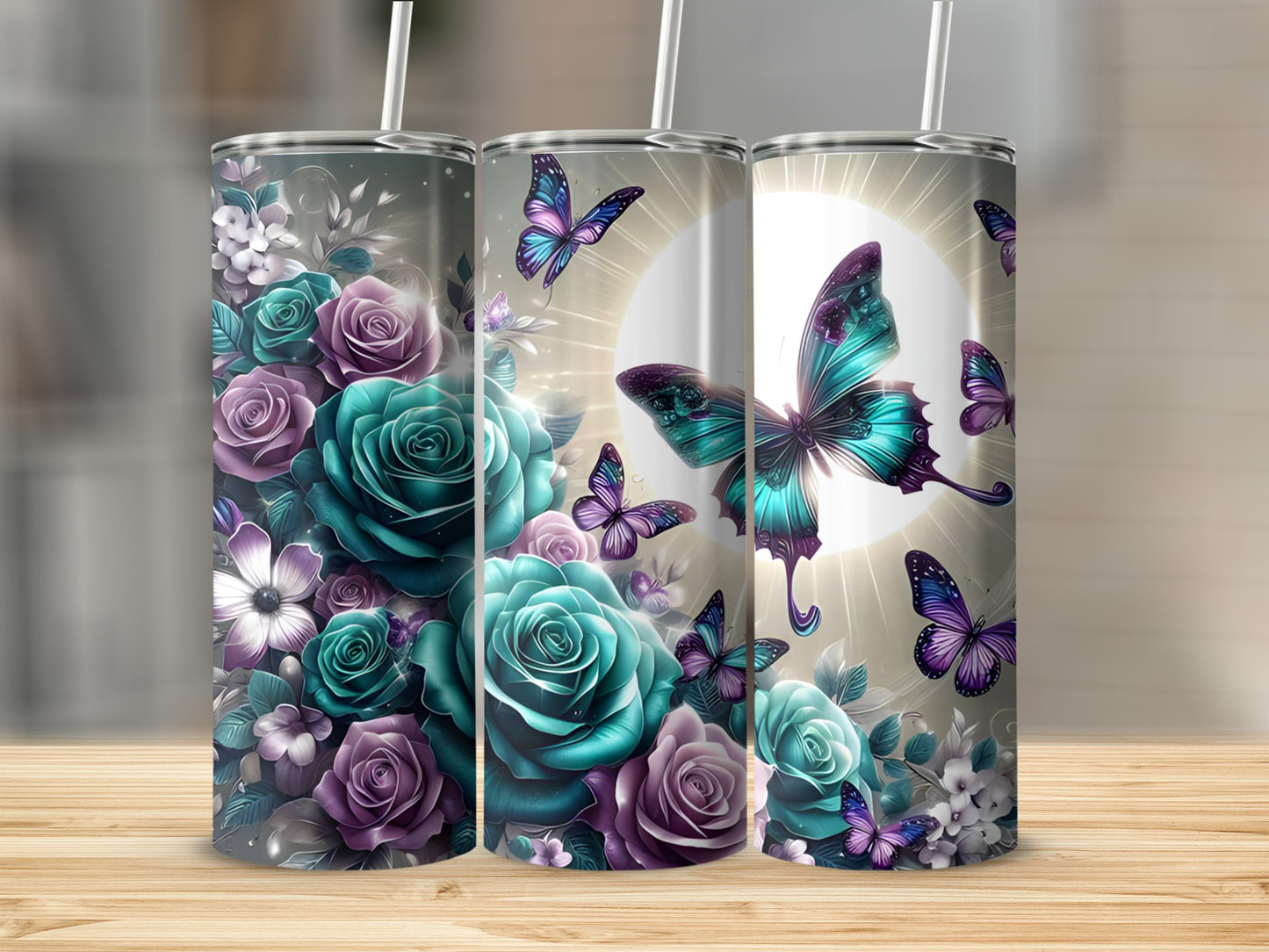 Three tumblers with purple and teal roses and butterflies.