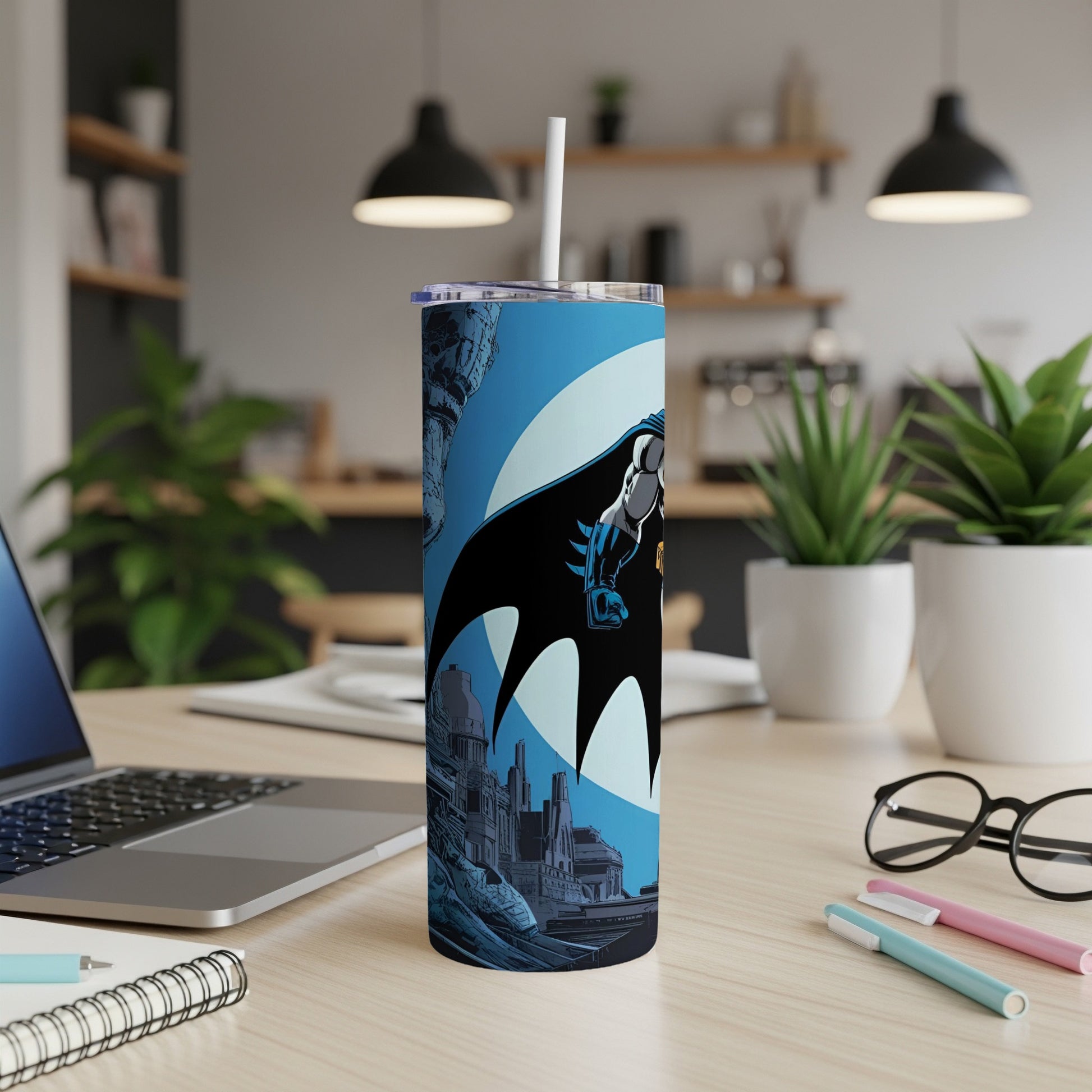 Batman tumbler with Gotham City silhouette and a straw.