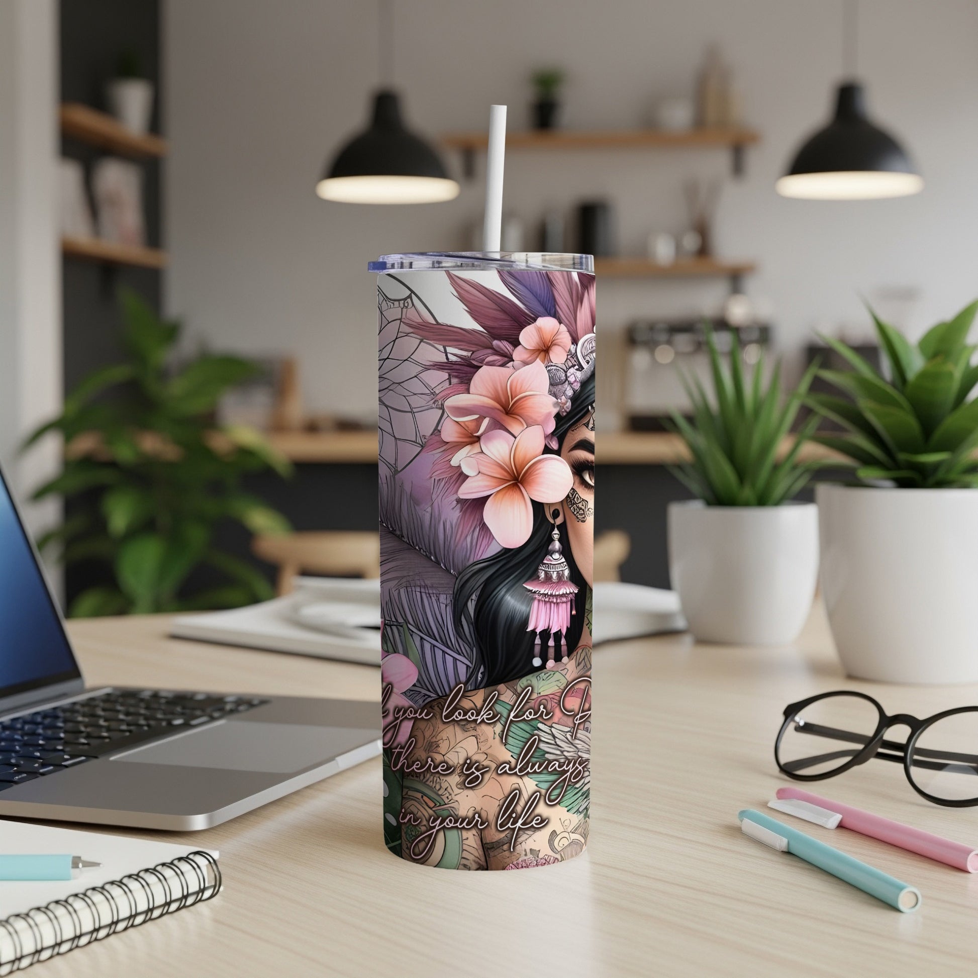 Tumbler with floral design and woman's face, "you look for joy" text.