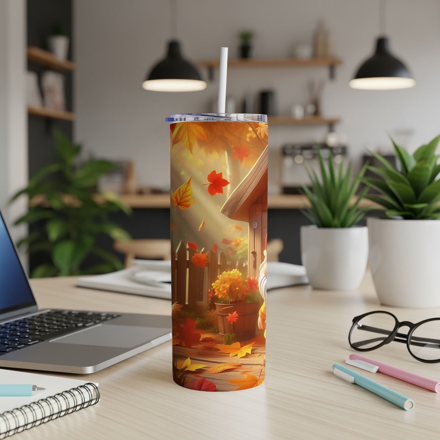 Tumbler with falling autumn leaves and a wooden fence illustration.