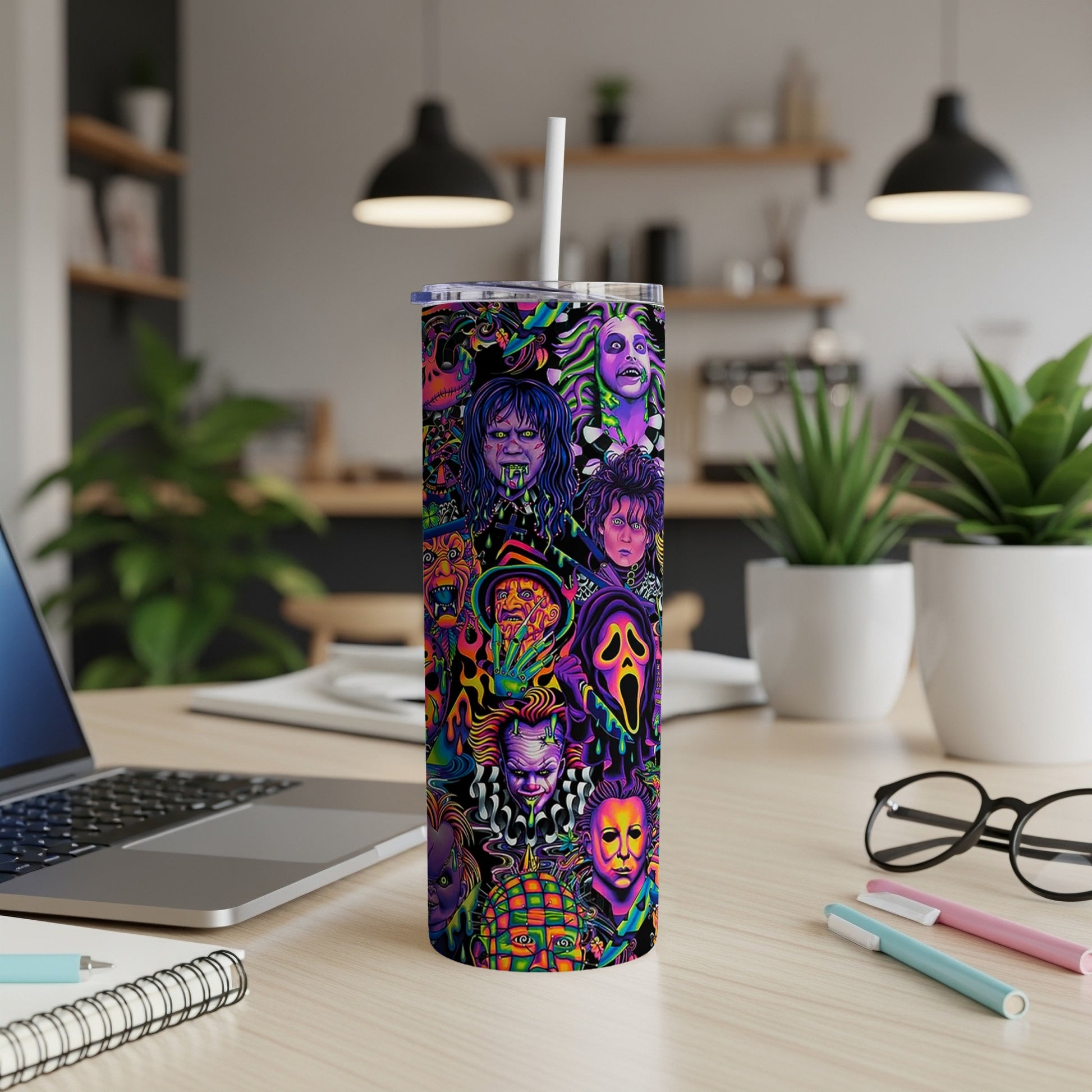 Tumbler with a collage of colorful horror movie characters.