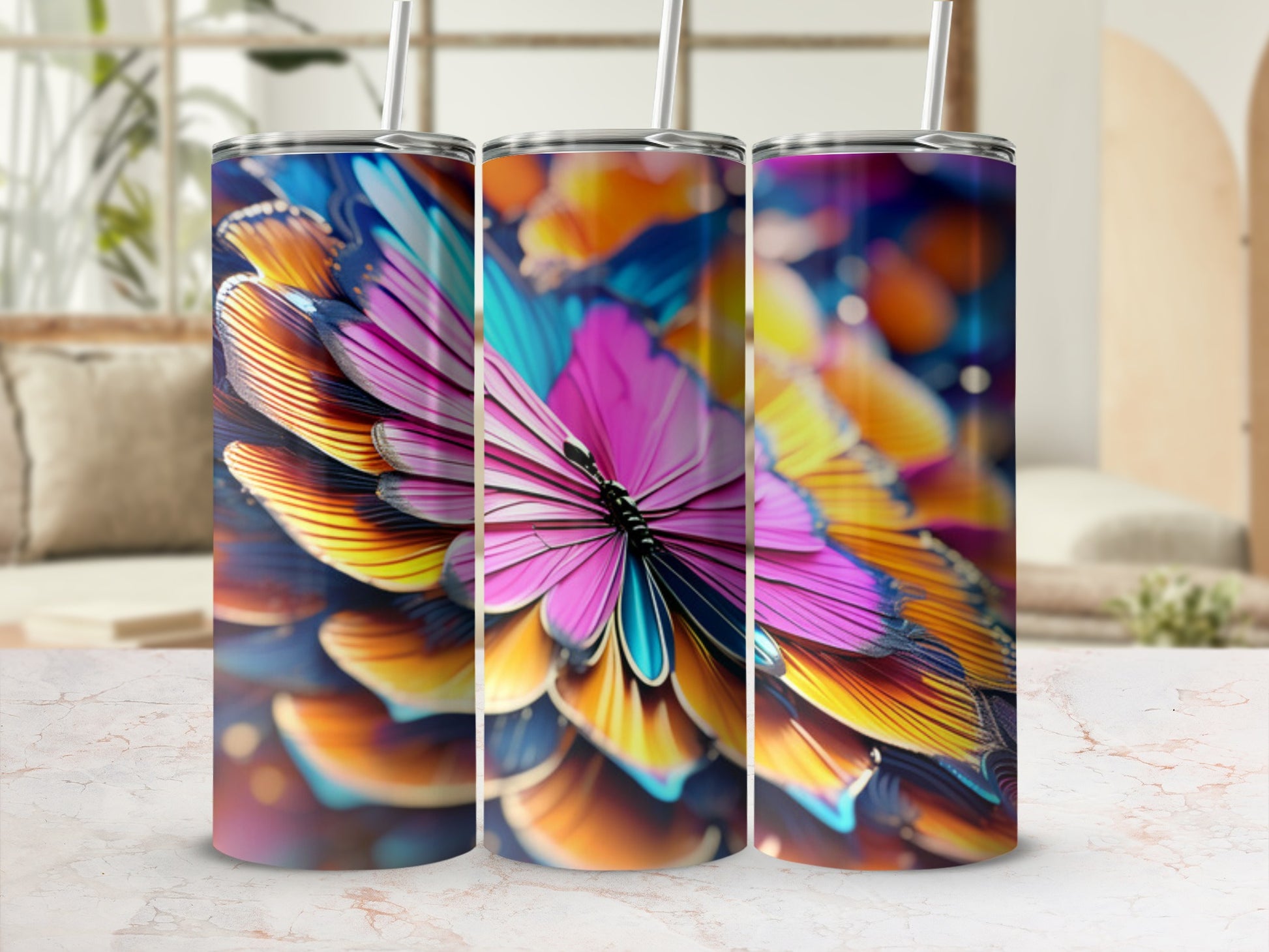 Triptych of tumblers featuring vibrant, abstract butterfly wing patterns.