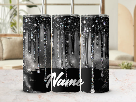 Three tumblers with black dripping glitter and crystal accents, one displays the word "Name".