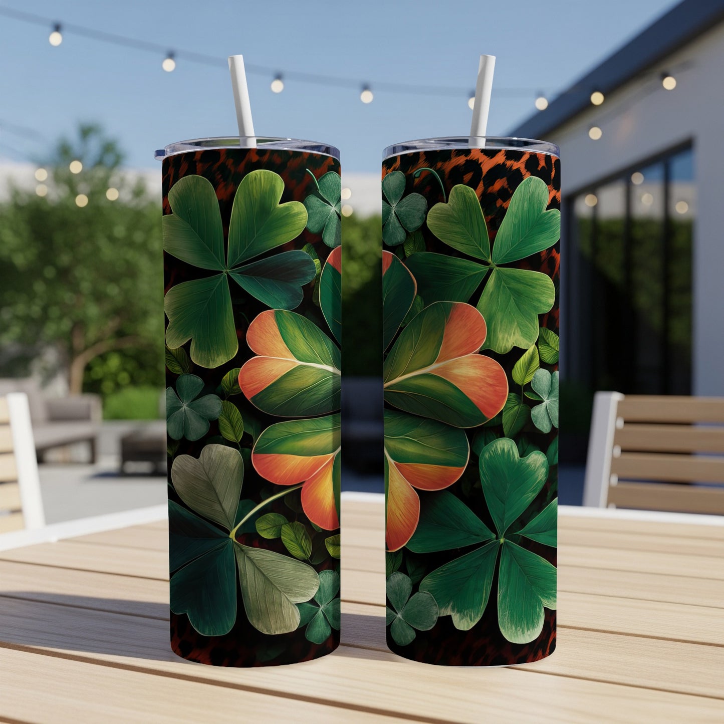 Two skinny tumblers with a shamrock and leopard print design.