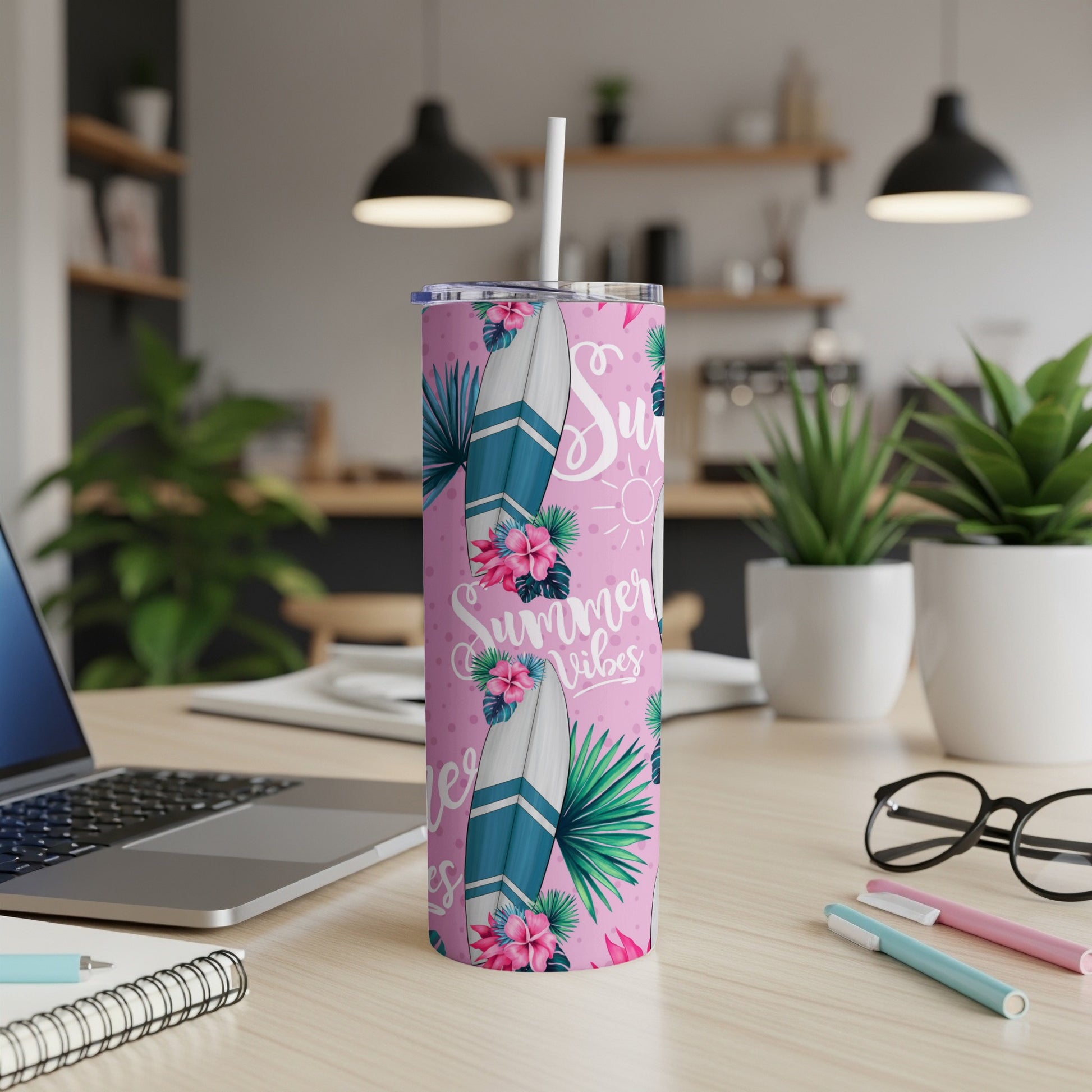 Pink tumbler with tropical leaves and "Summer Vibes" text.