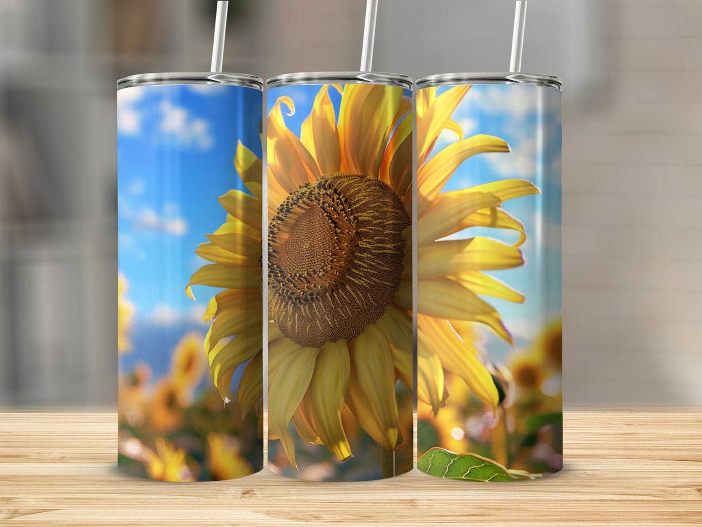 Sunflower design on a stainless steel tumbler with a wooden surface.