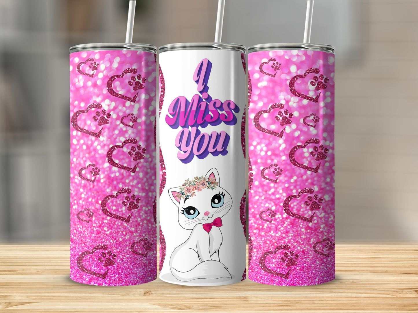 White cat wearing a pink bow on a pink glitter tumbler reading "I Miss You".