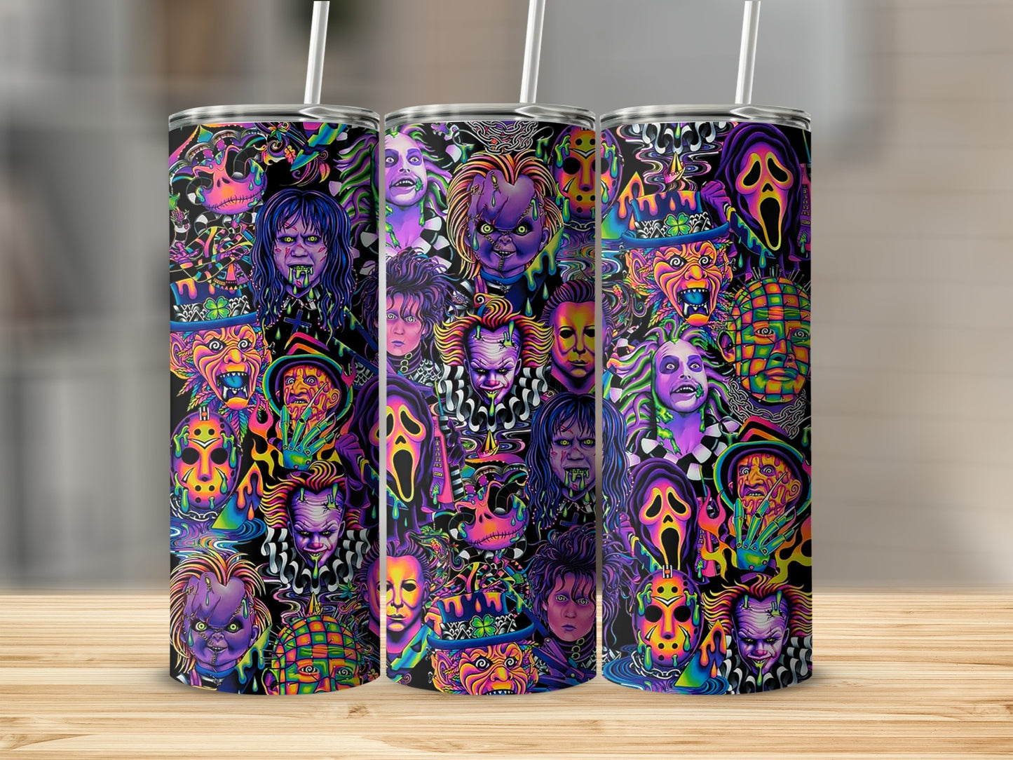Tumbler with horror movie characters in a colorful, psychedelic pattern.