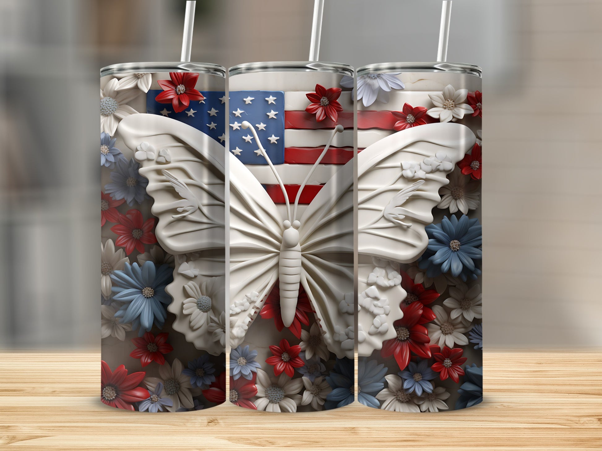 White butterfly and flowers on a US flag tumbler.