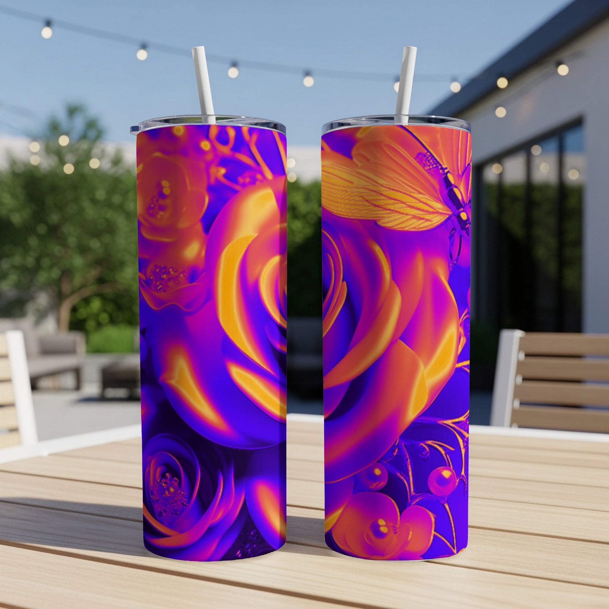 Two tumblers with vibrant purple and orange floral and butterfly designs.