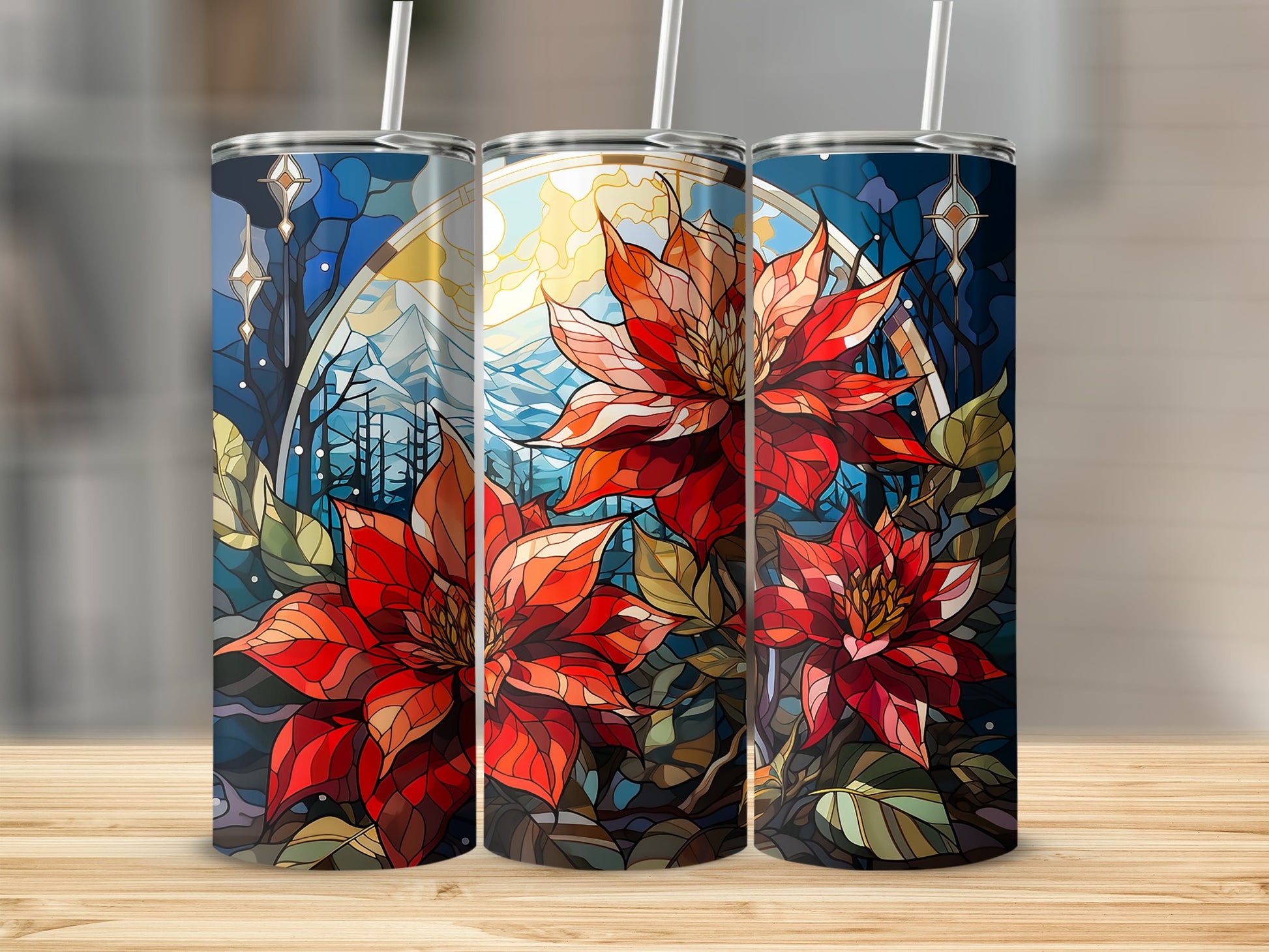Stained glass poinsettias with snowy forest backdrop on three tumblers.