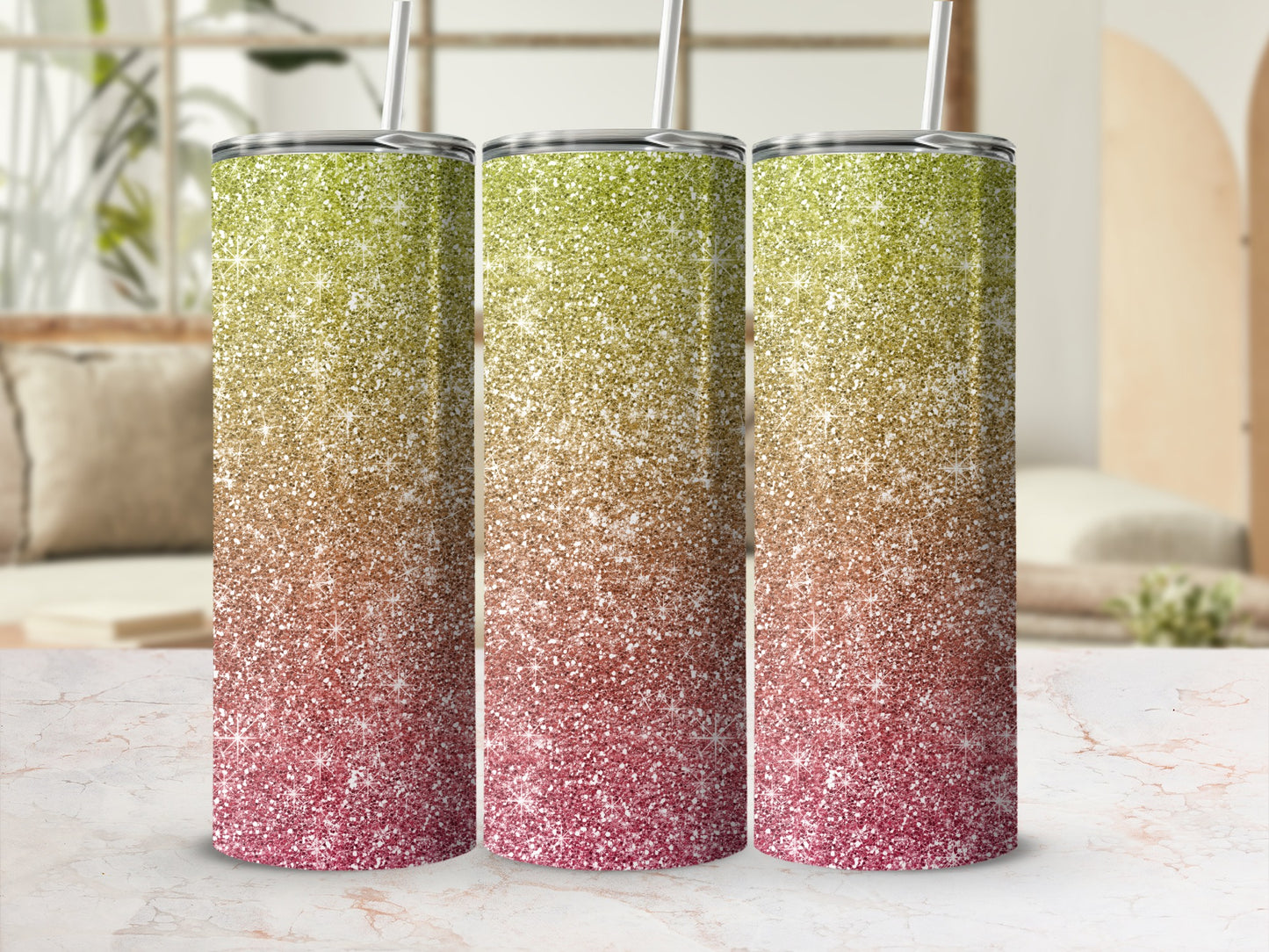 Three tumblers with glitter gradient in gold, green and pink, with straws.