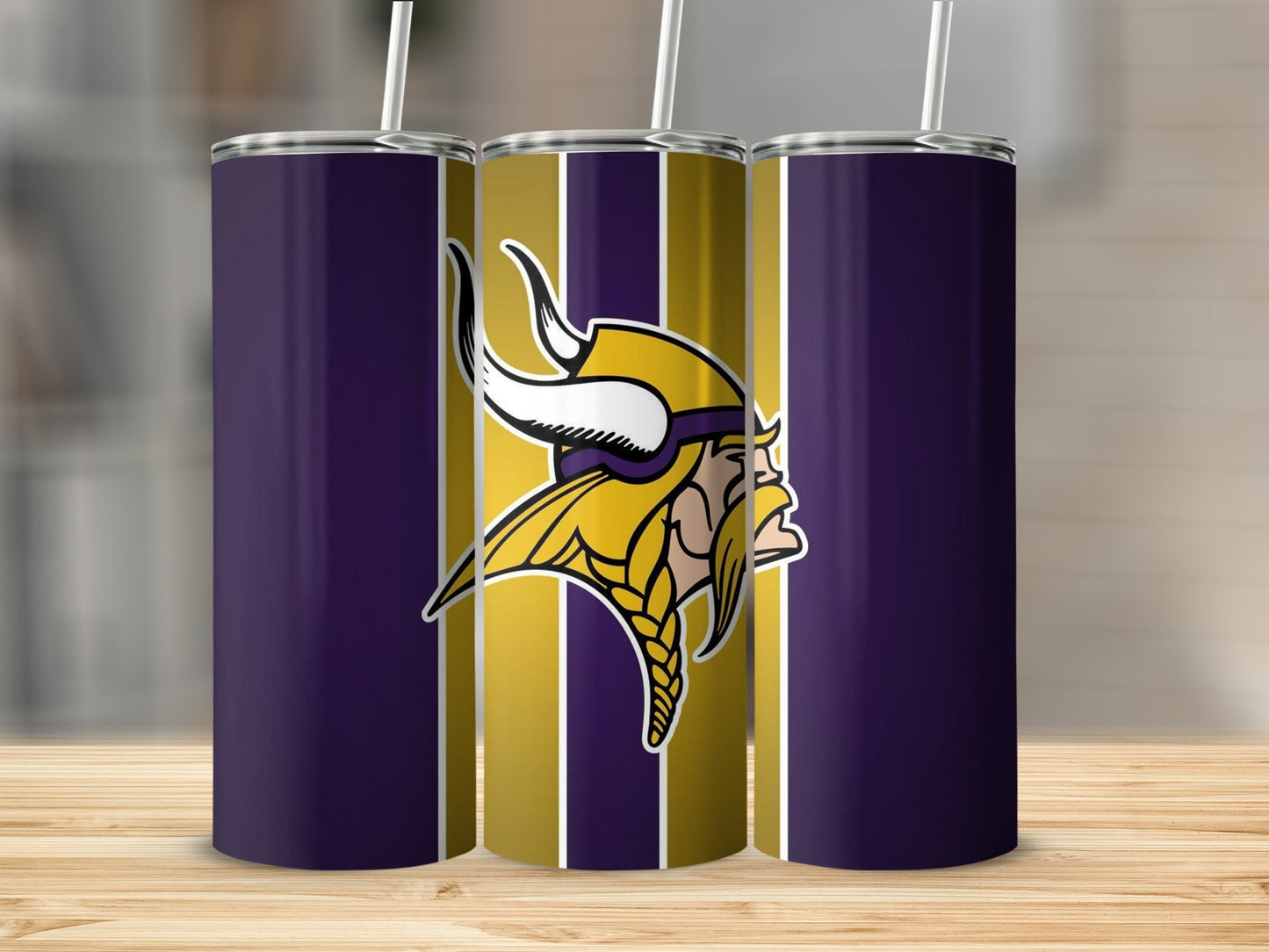 Three purple tumblers with Minnesota Vikings logo and stripes.
