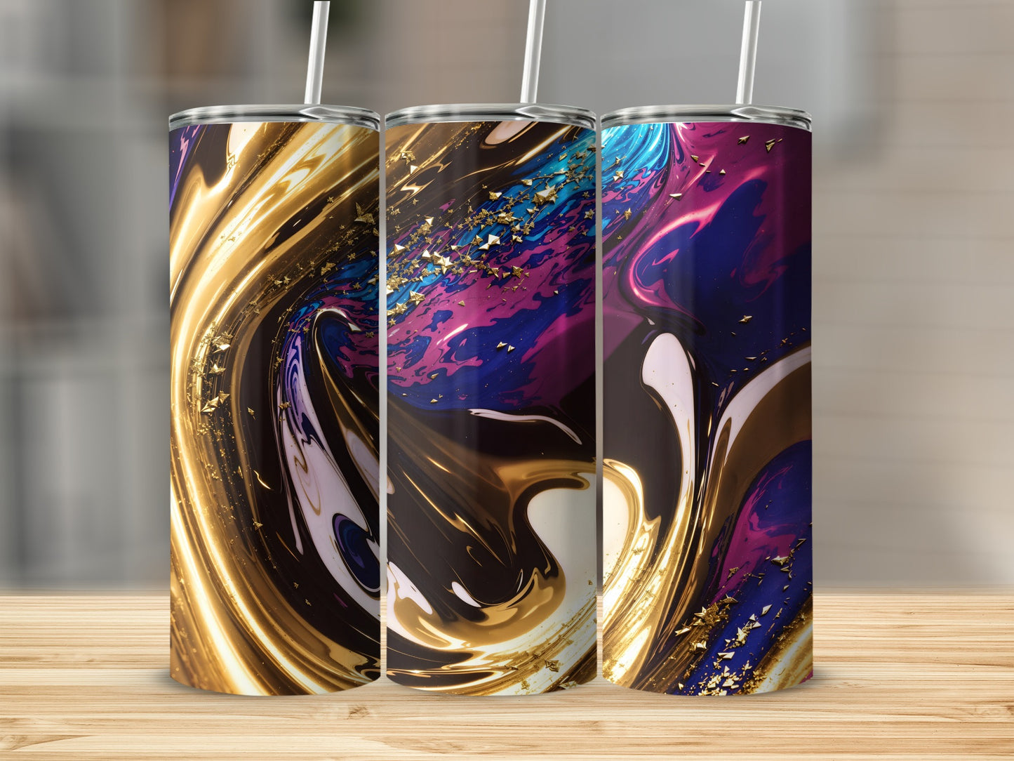 Three abstract art tumblers with gold glitter and swirling colors.