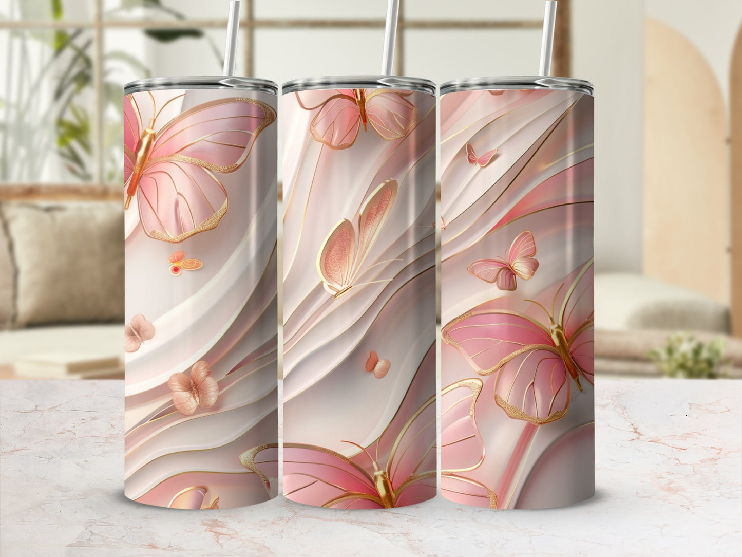 Three tumblers with pink butterflies and wavy golden accents.