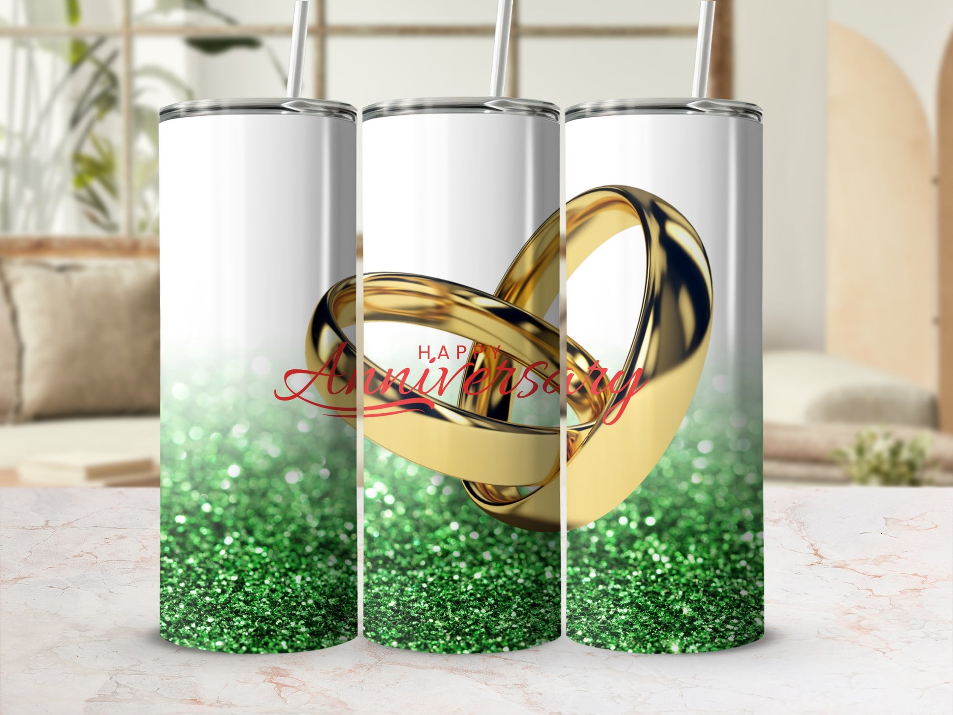 Trio of tumblers with intertwined gold rings and "Happy Anniversary" text.