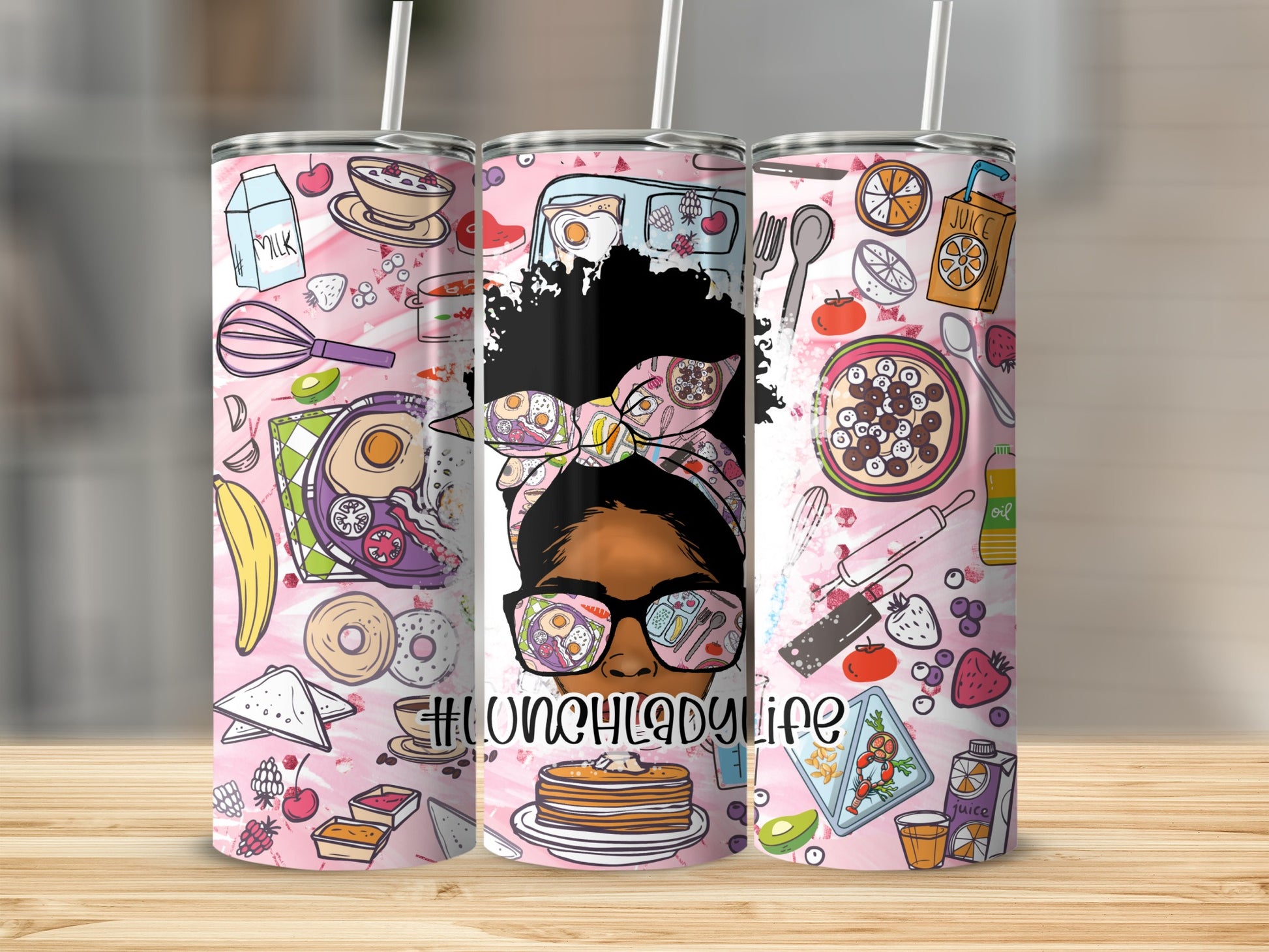 Pink tumbler with a woman's face and food graphics, "LunchladyLife" text.
