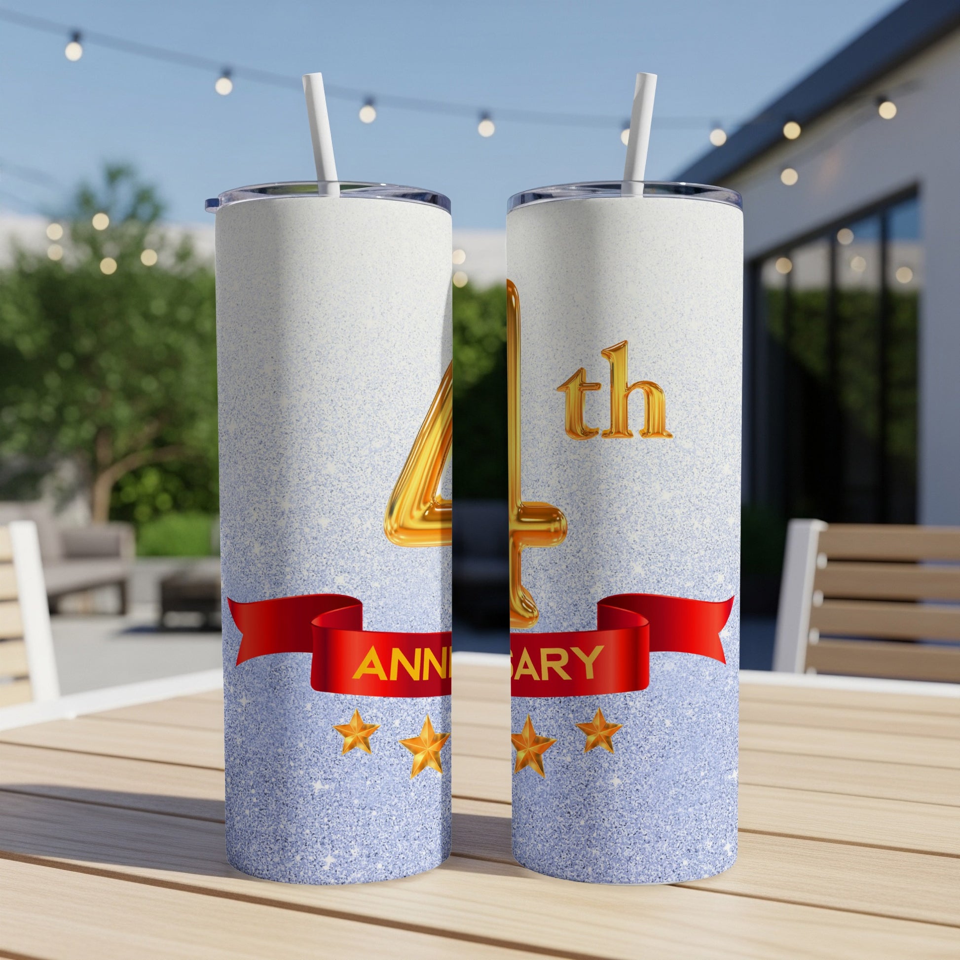 Tall tumbler with "4th Anniversary" text and golden stars.