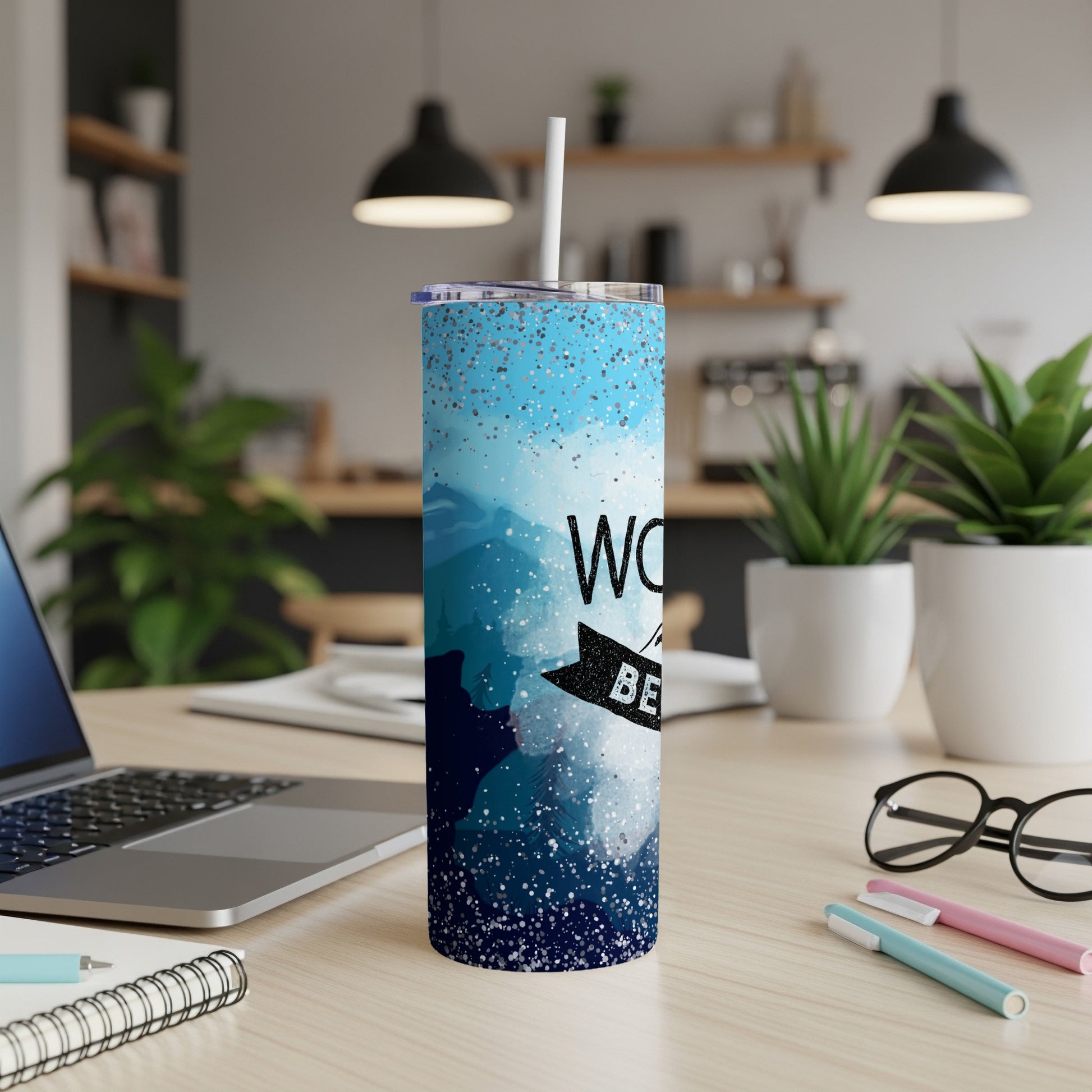Blue speckled tumbler with text "WORST PERSON BEST LIFE" on desk.