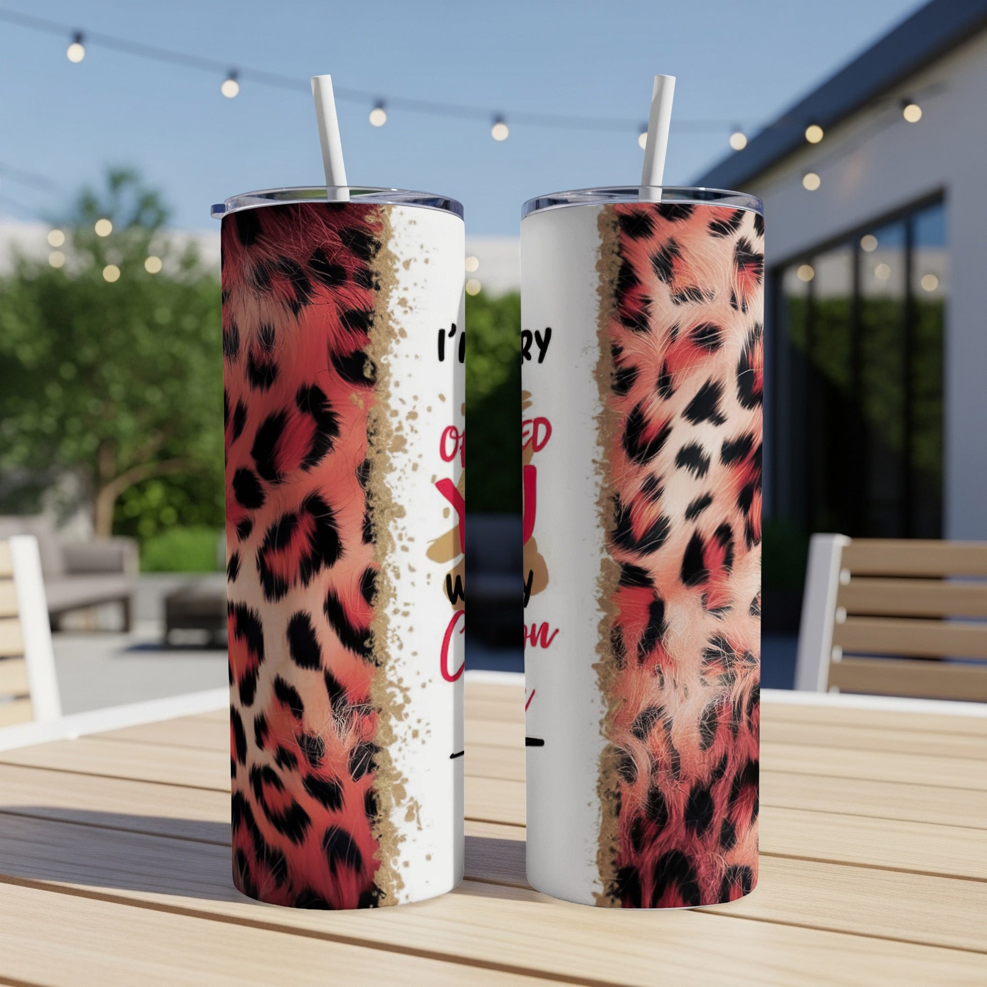Leopard print tumbler with "I'm sorry" text and cartoon reindeer.