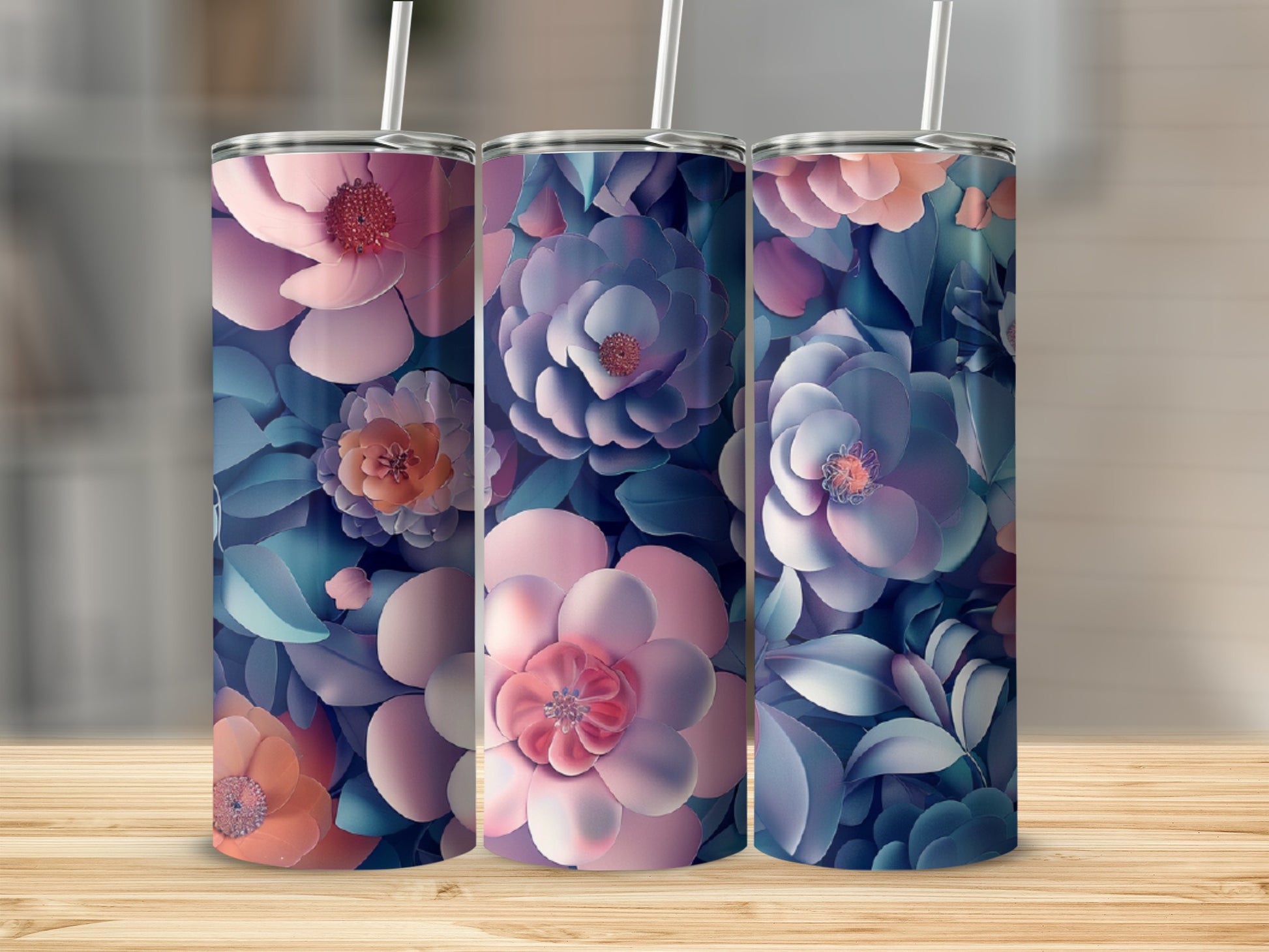 Three tumblers with abstract floral designs in shades of pink, blue, and purple.