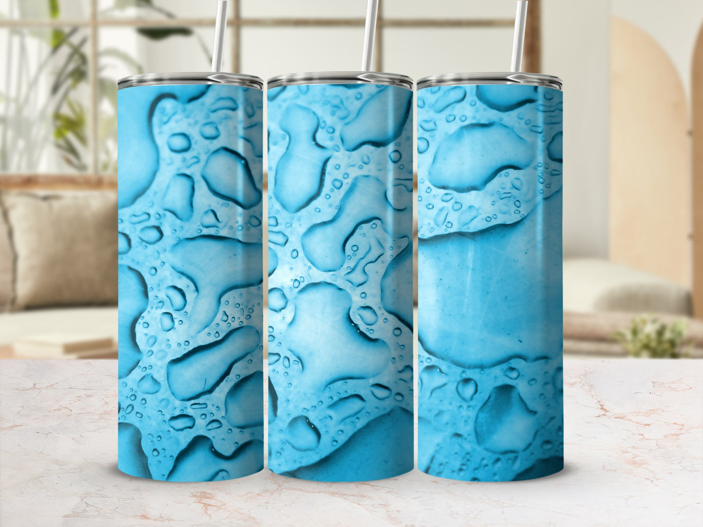 Three blue tumblers with a water droplet pattern.
