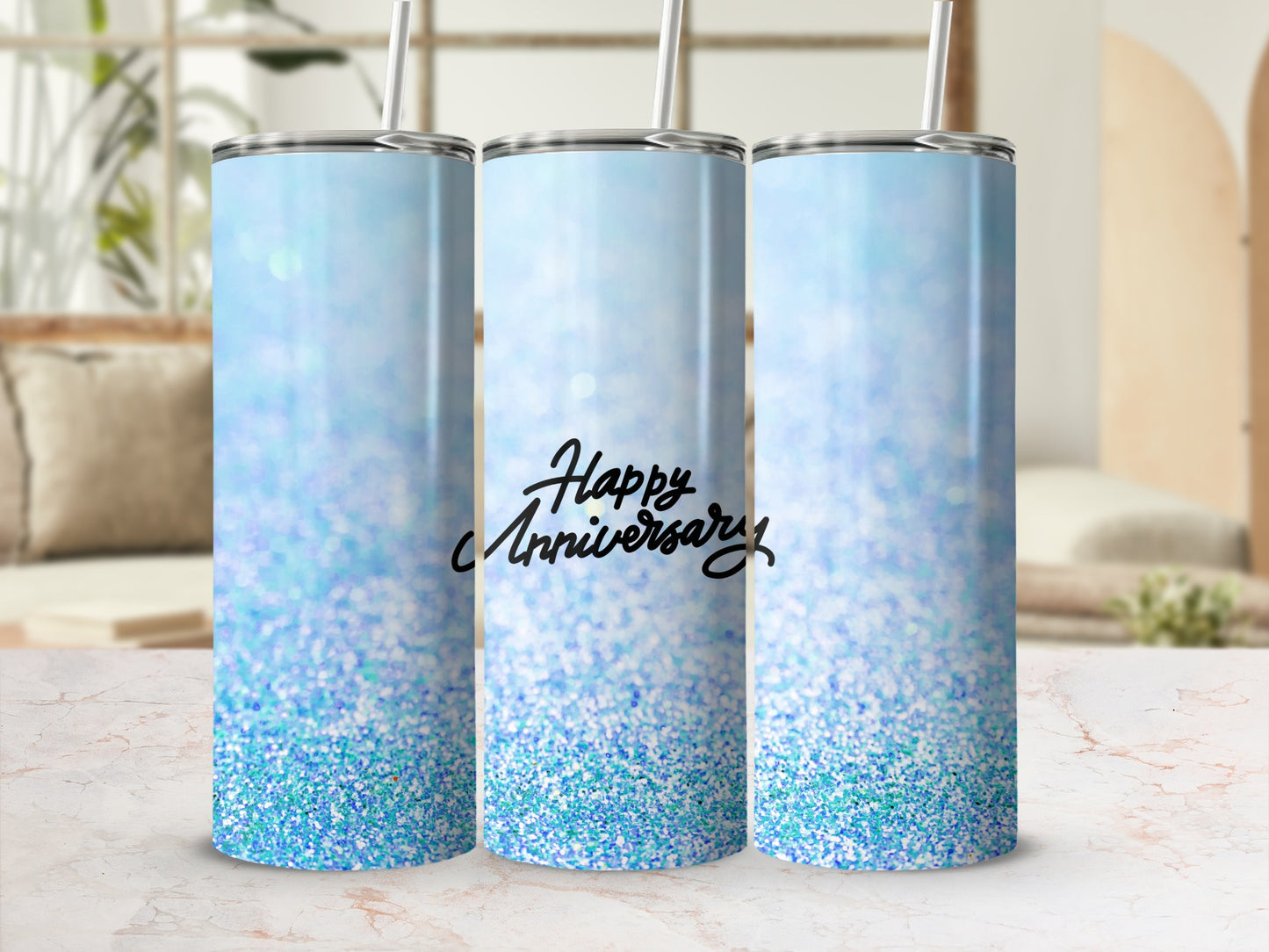 Blue glitter tumbler with "Happy Anniversary" text and a straw.