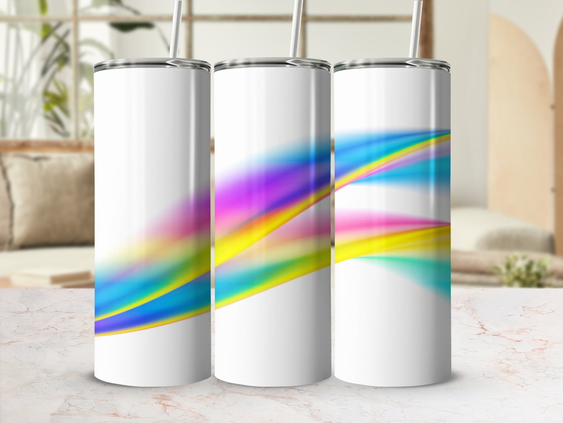 Three white tumblers with colorful abstract wave design.