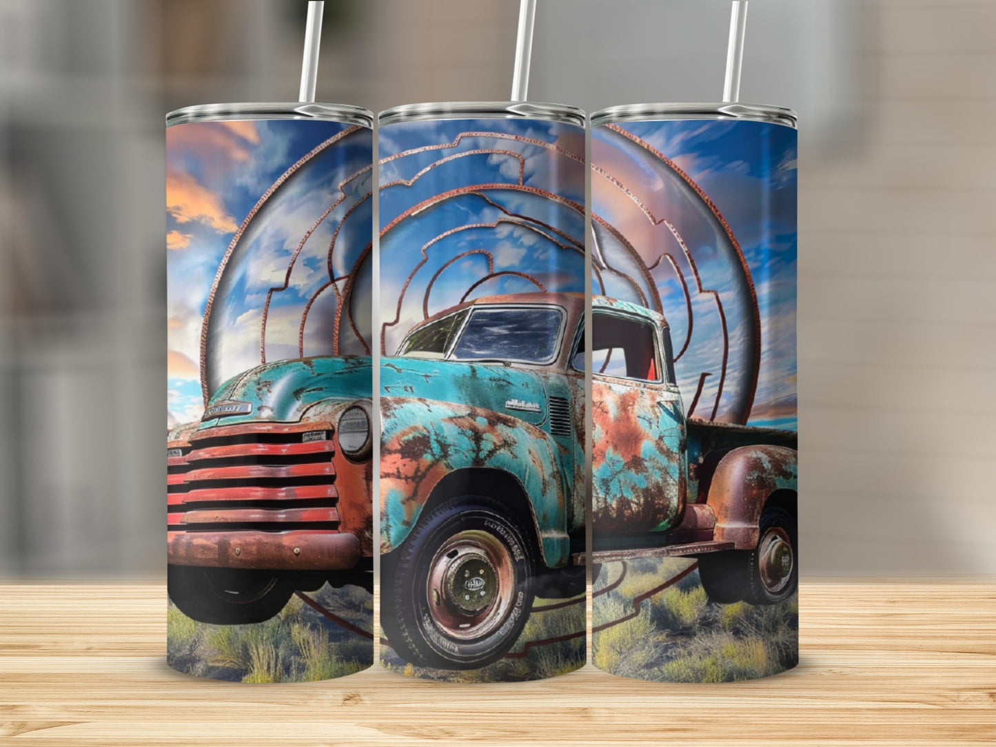 Rusty vintage blue pickup truck with spiral design in sky.