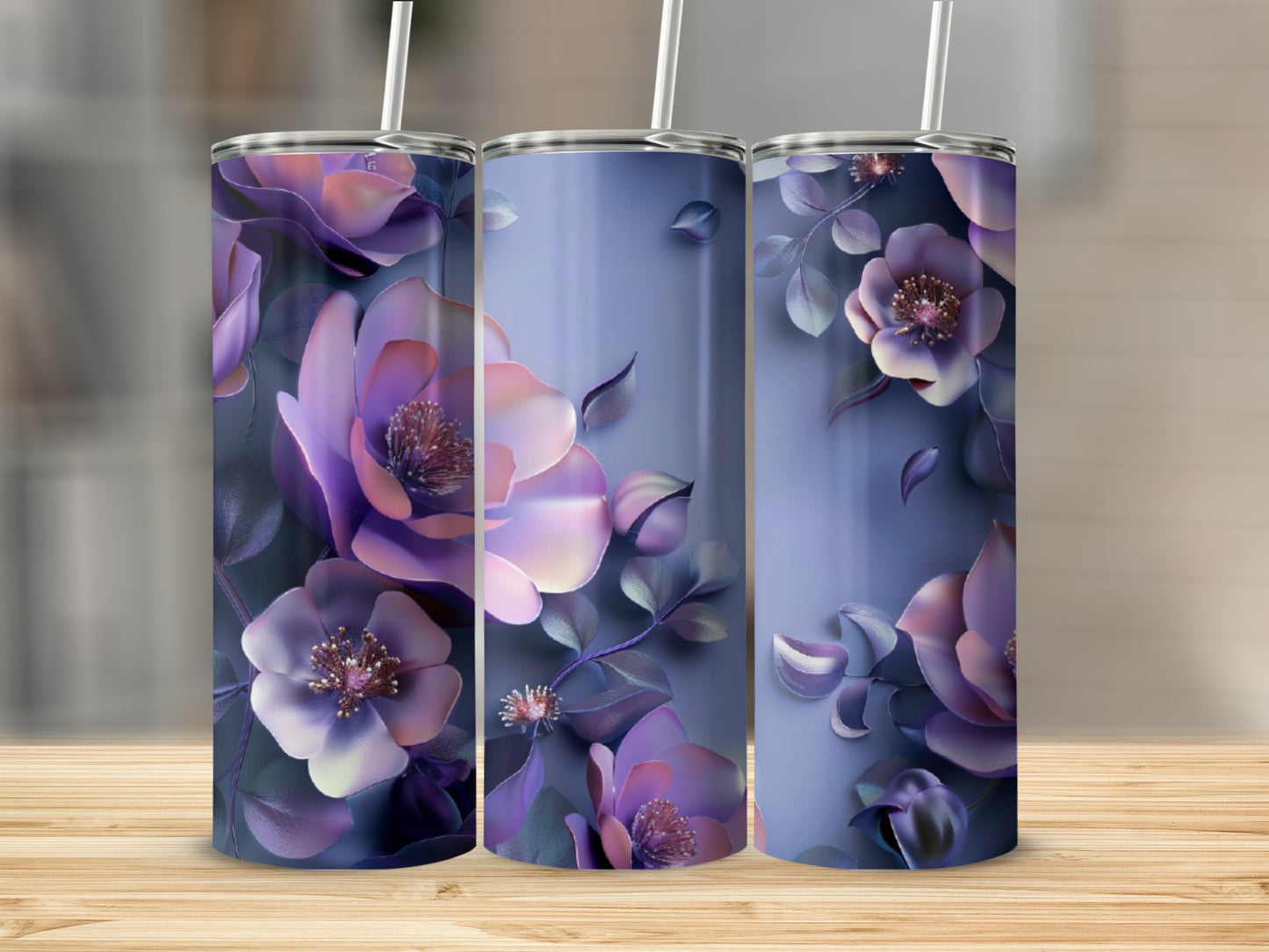 Purple floral design on three tumblers, one at center, two flanking.