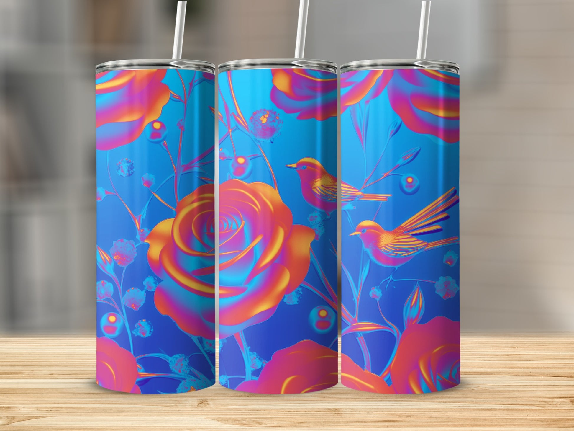 Blue tumbler with vibrant roses and birds, set on a wooden surface.