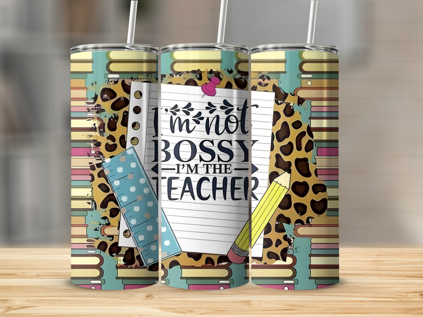 "I'm Not Bossy, I'm the Teacher" tumbler with notebook, ruler, and pencil design.