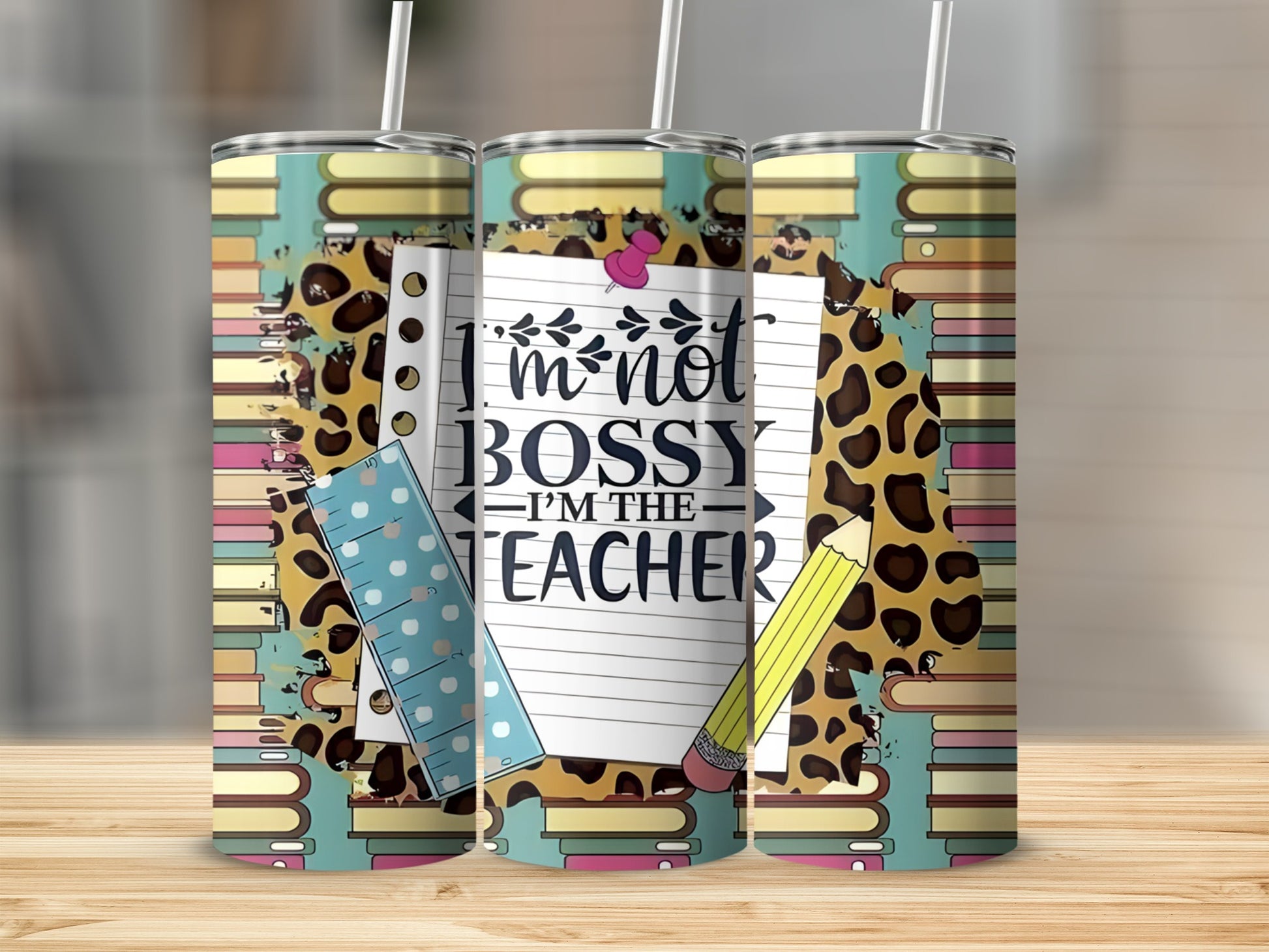 "I'm Not Bossy, I'm the Teacher" tumbler with notebook, ruler, and pencil design.