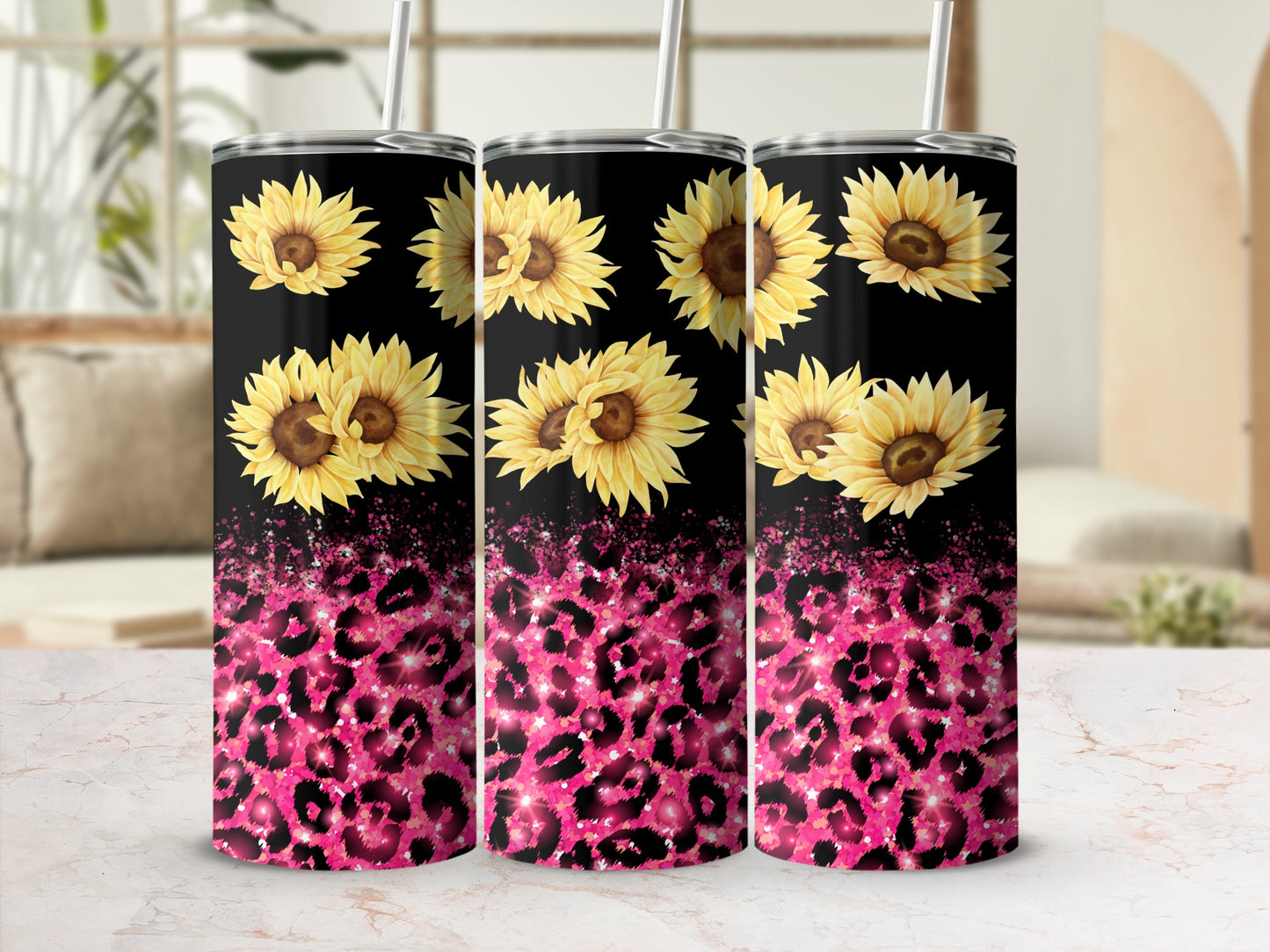 Three tumblers with sunflowers and pink leopard print.
