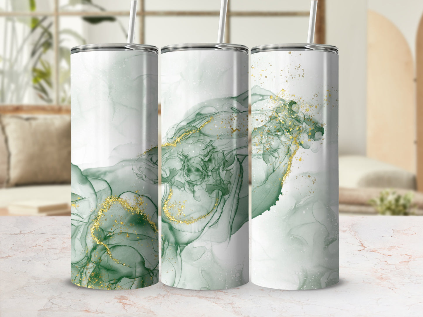Three tumblers with green and gold abstract marble design.