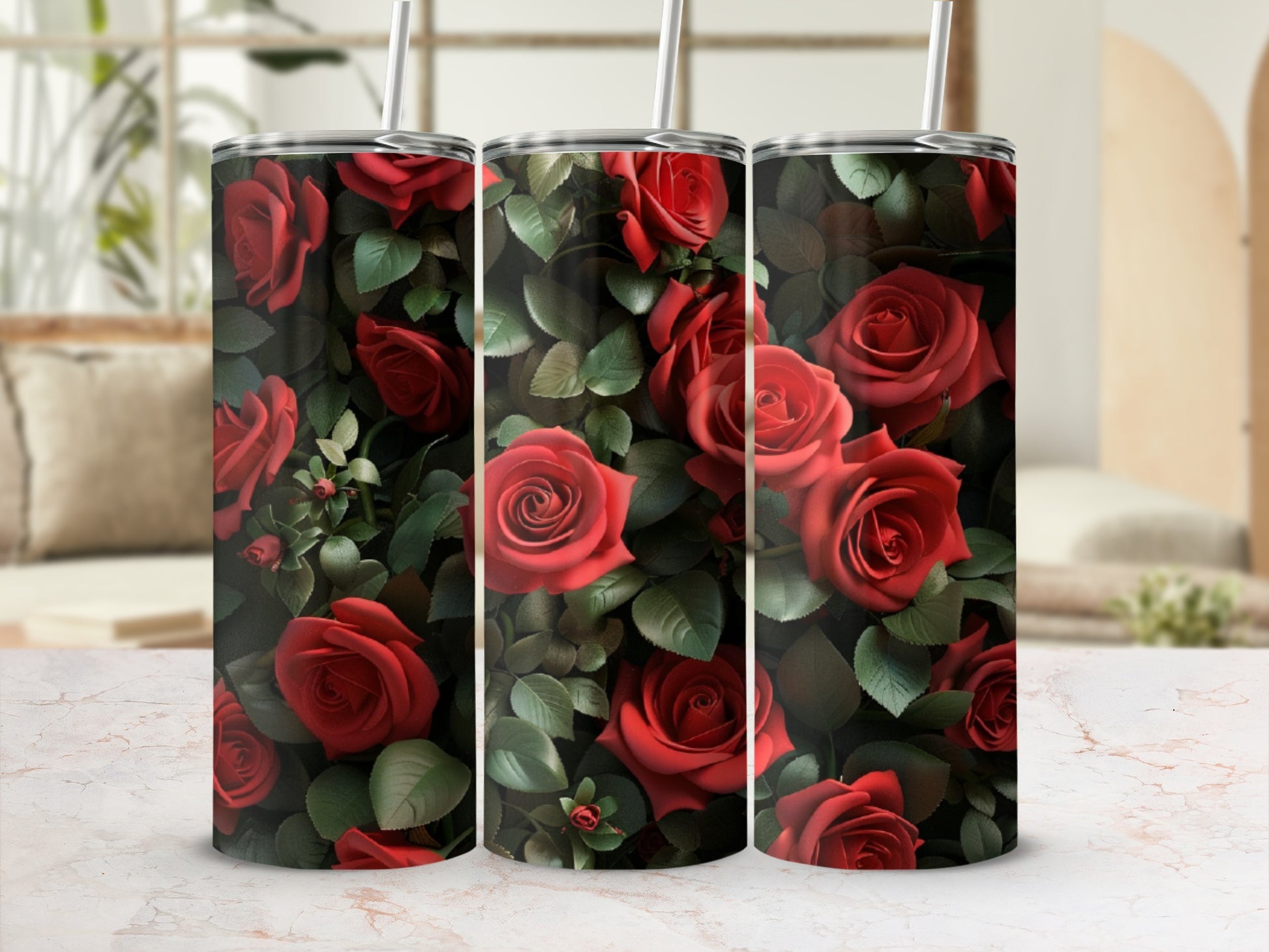 Three tumblers with a repeating pattern of red roses and green leaves.