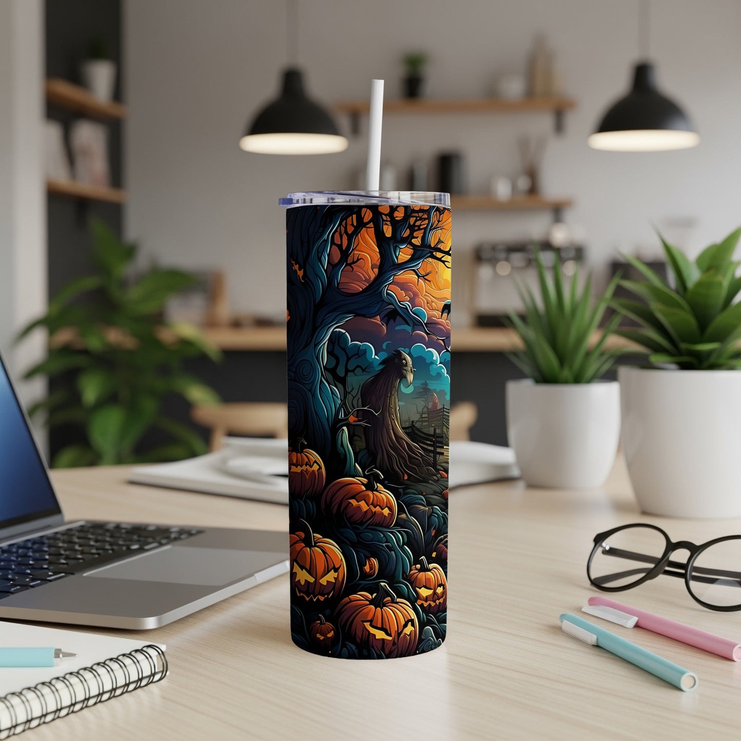 Tall tumbler with a Halloween scene featuring jack-o'-lanterns, a spooky tree, and a ghost.