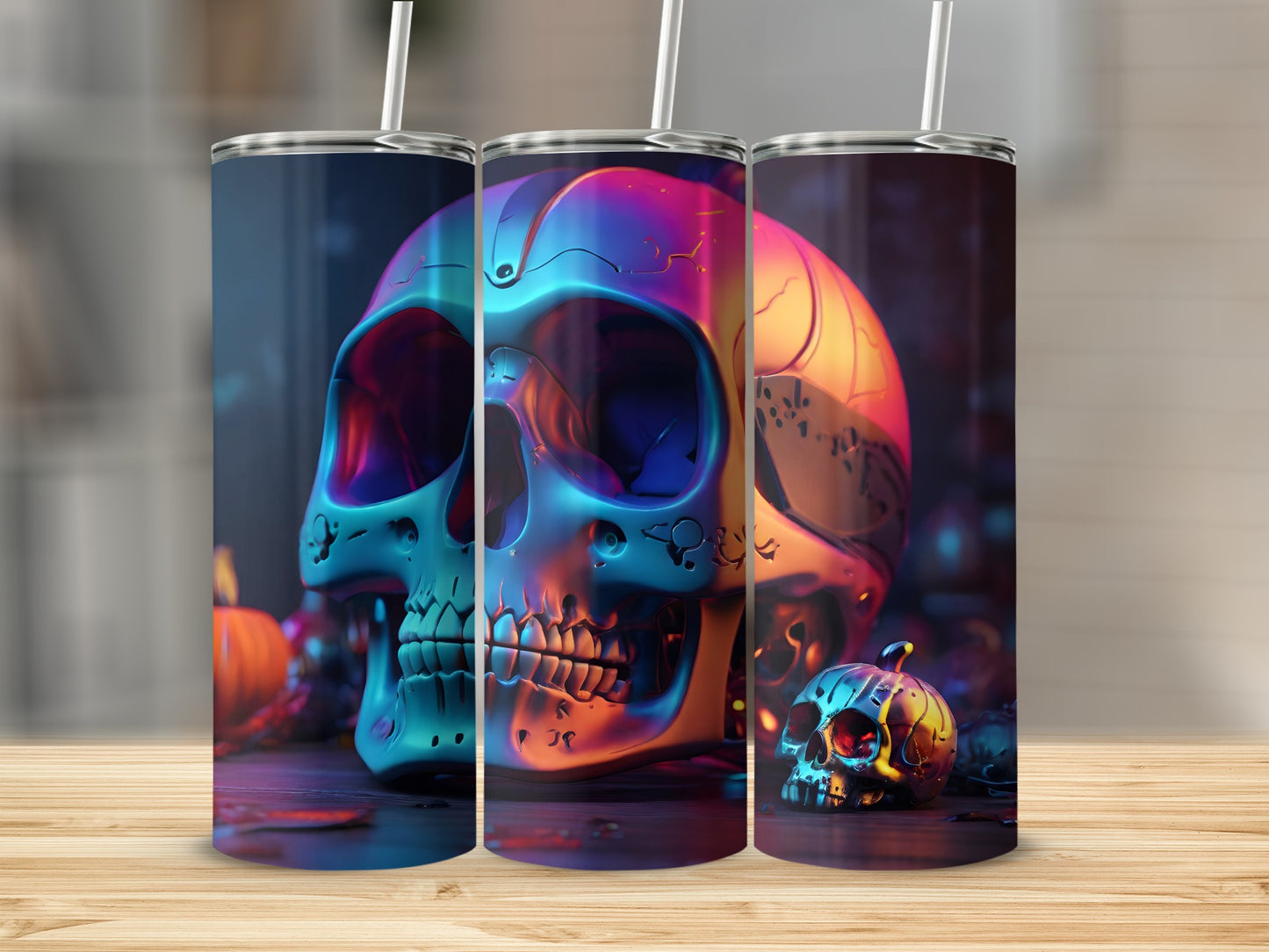 Three iridescent tumblers featuring colorful skull designs with straw.