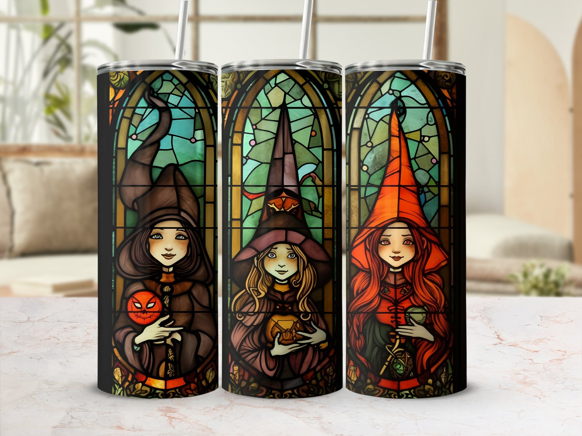Three stained glass tumblers featuring witches holding pumpkins and gourds.
