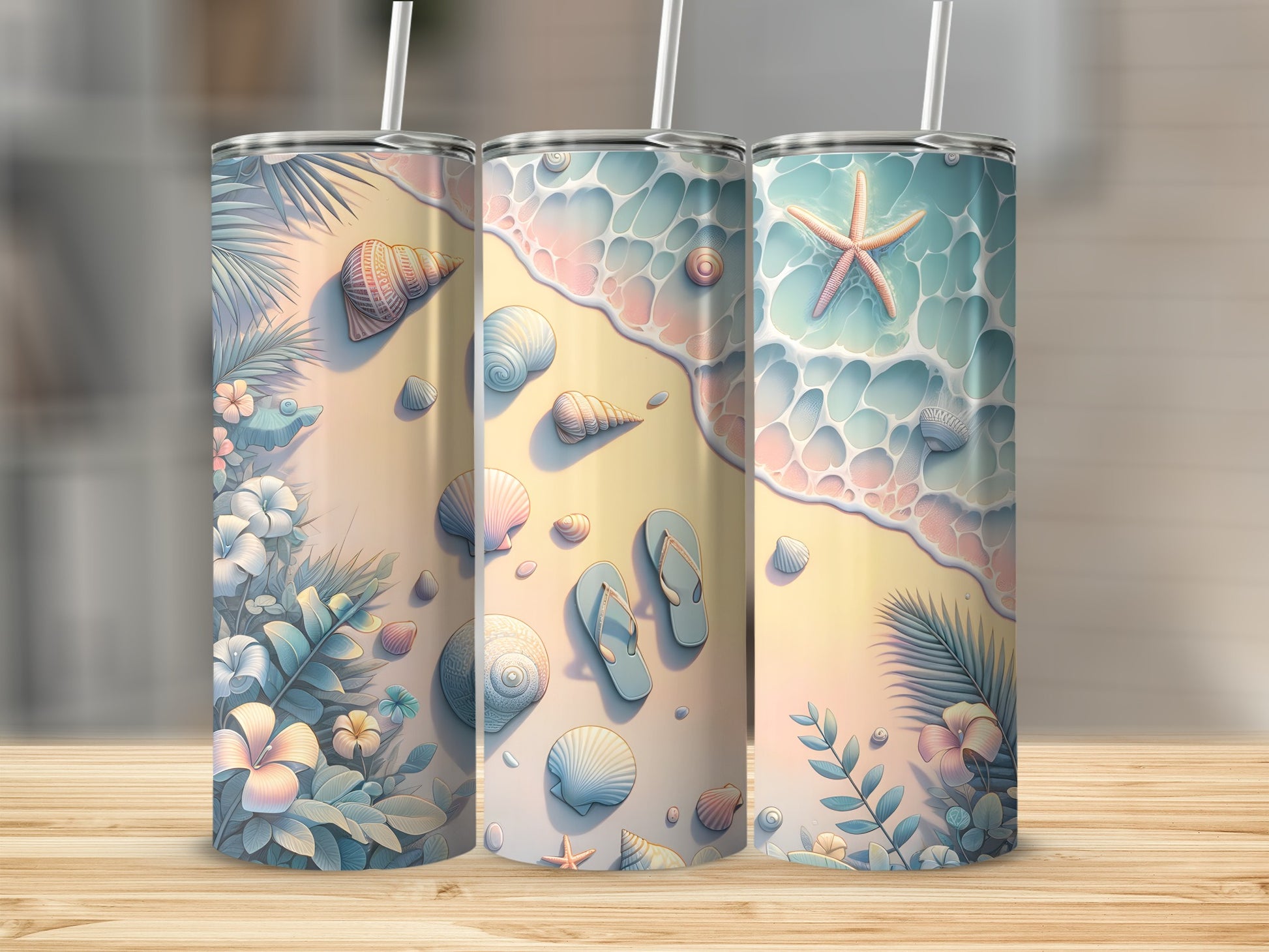 Three tumblers with a beach and seashell design.