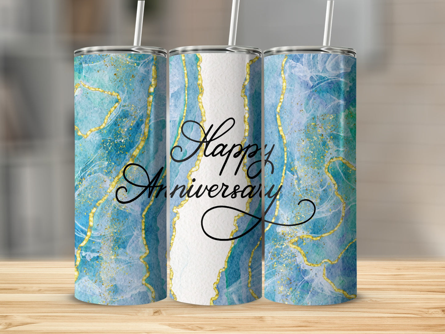 Three tumblers with blue marble and gold accents, reading "Happy Anniversary".