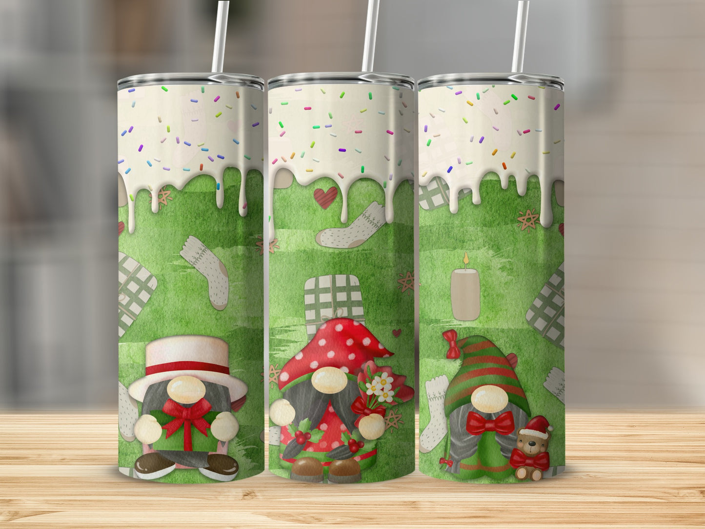 Three gnome tumblers with festive holiday designs.